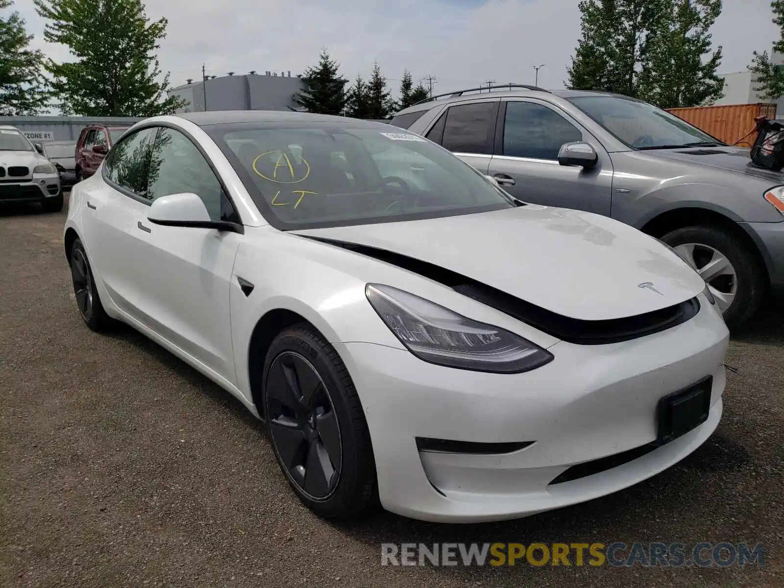 1 Photograph of a damaged car 5YJ3E1EA2MF852363 TESLA MODEL 3 2021