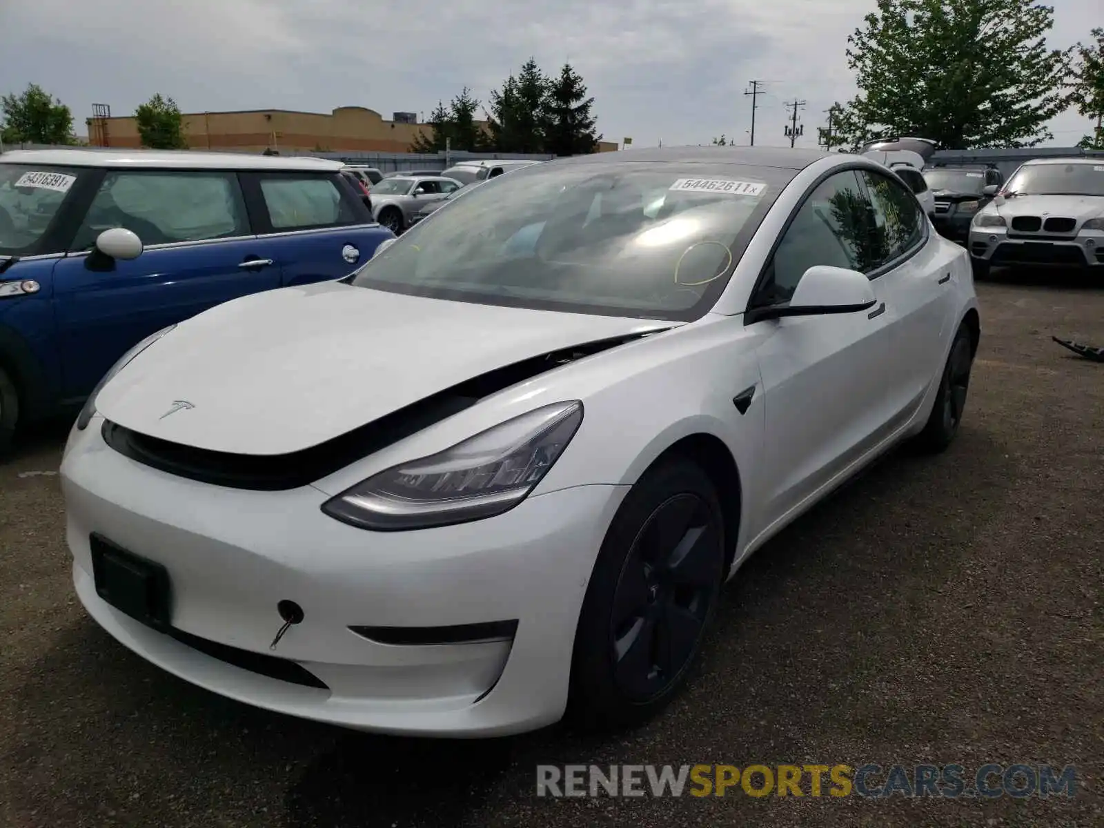 2 Photograph of a damaged car 5YJ3E1EA2MF852363 TESLA MODEL 3 2021