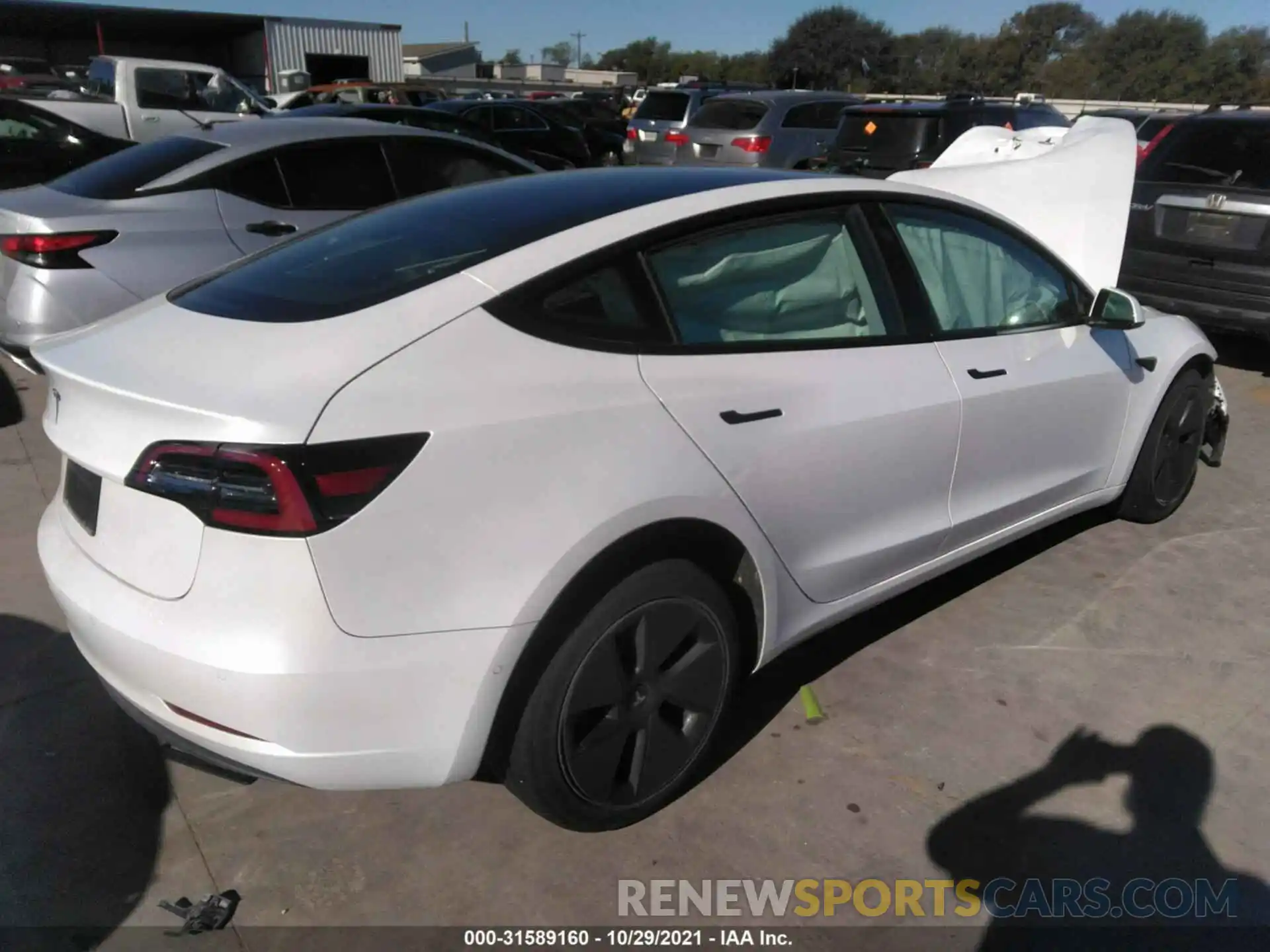 4 Фотография поврежденного автомобиля 5YJ3E1EA2MF854985 TESLA MODEL 3 2021