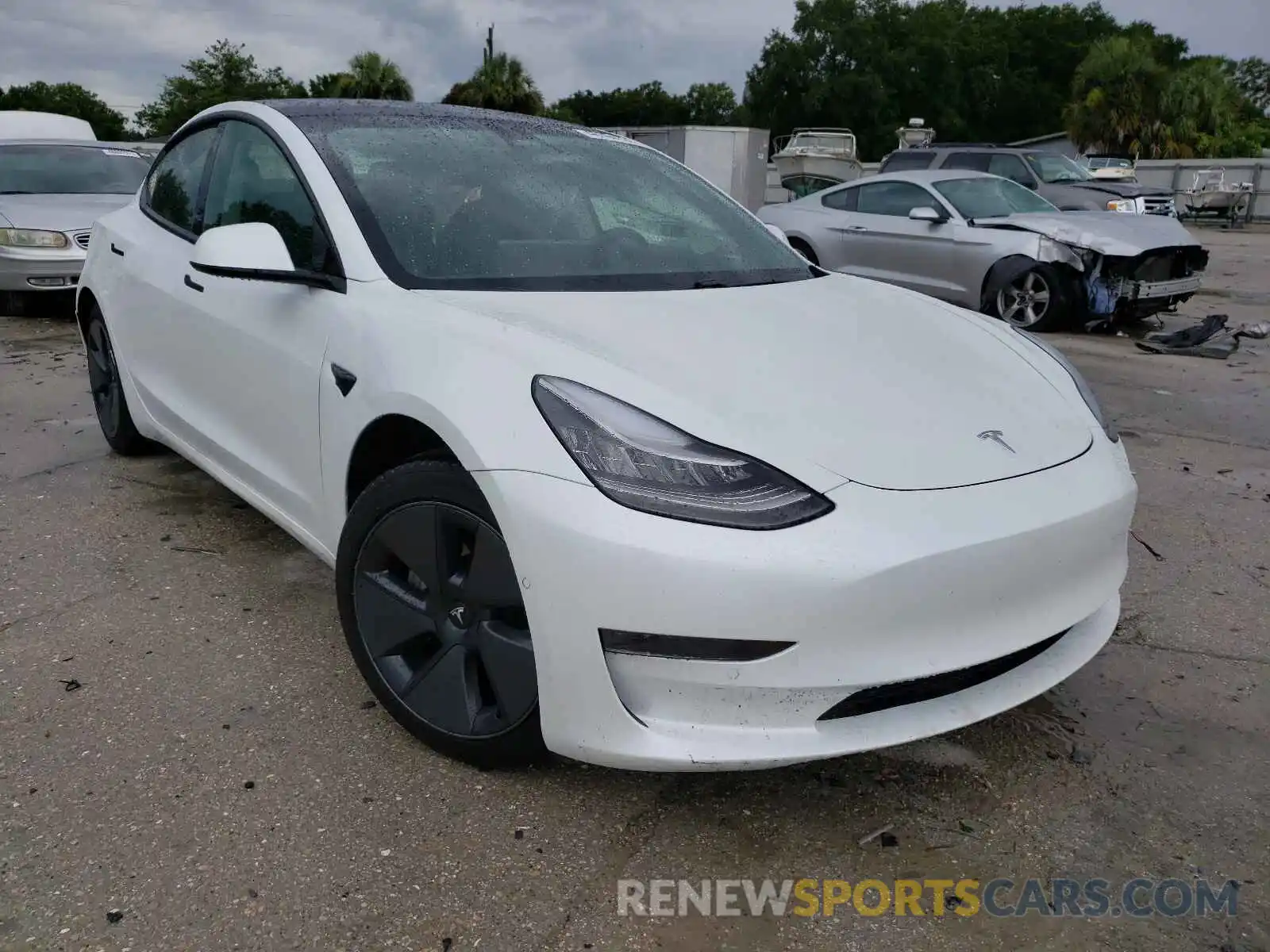 1 Photograph of a damaged car 5YJ3E1EA2MF854999 TESLA MODEL 3 2021