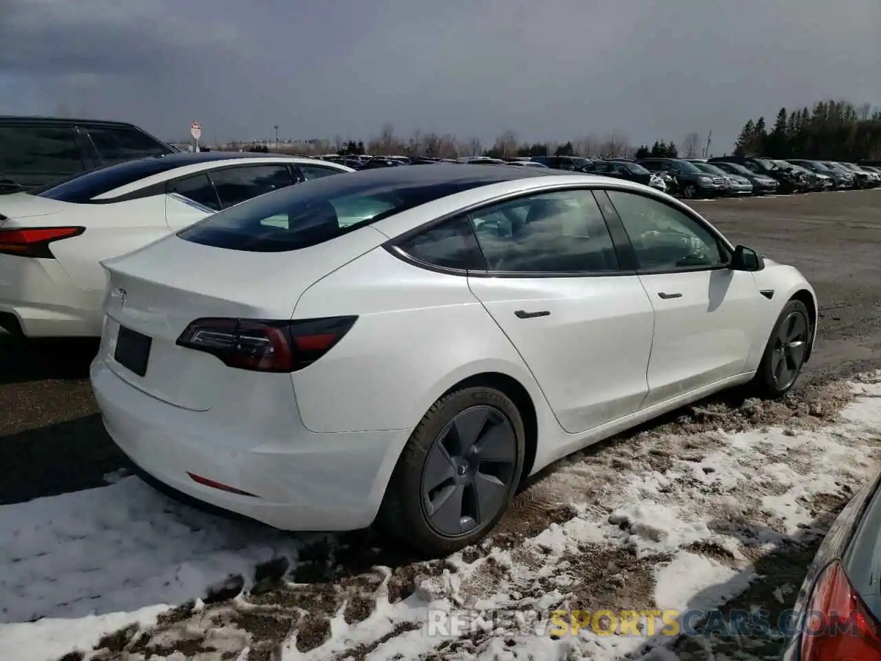 4 Photograph of a damaged car 5YJ3E1EA2MF871642 TESLA MODEL 3 2021