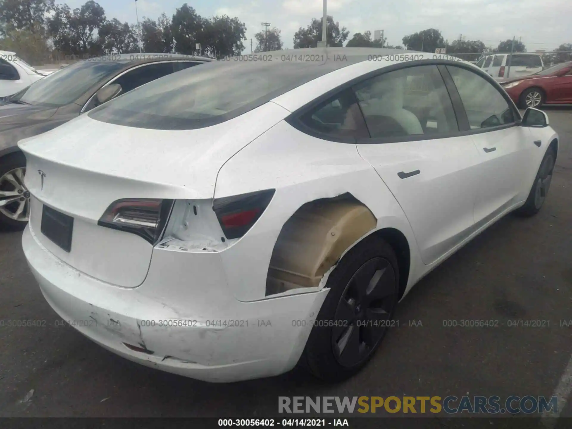 4 Photograph of a damaged car 5YJ3E1EA2MF873388 TESLA MODEL 3 2021