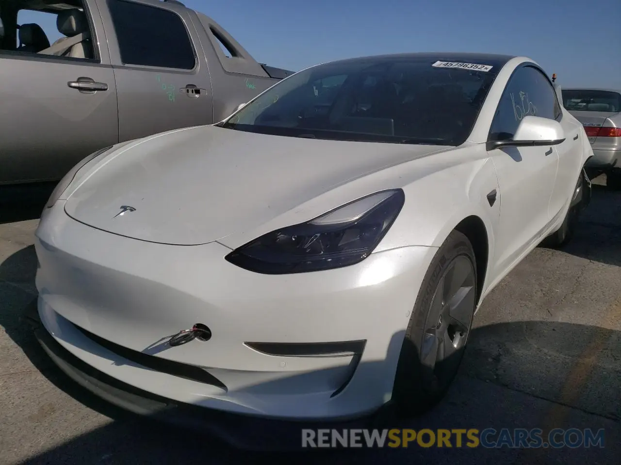 2 Photograph of a damaged car 5YJ3E1EA2MF874198 TESLA MODEL 3 2021