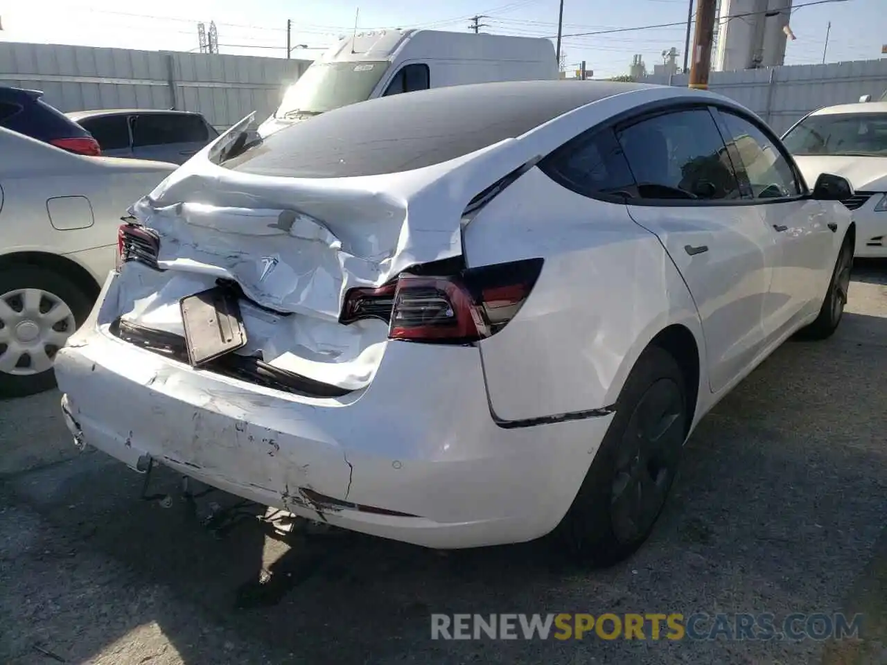 4 Photograph of a damaged car 5YJ3E1EA2MF874198 TESLA MODEL 3 2021