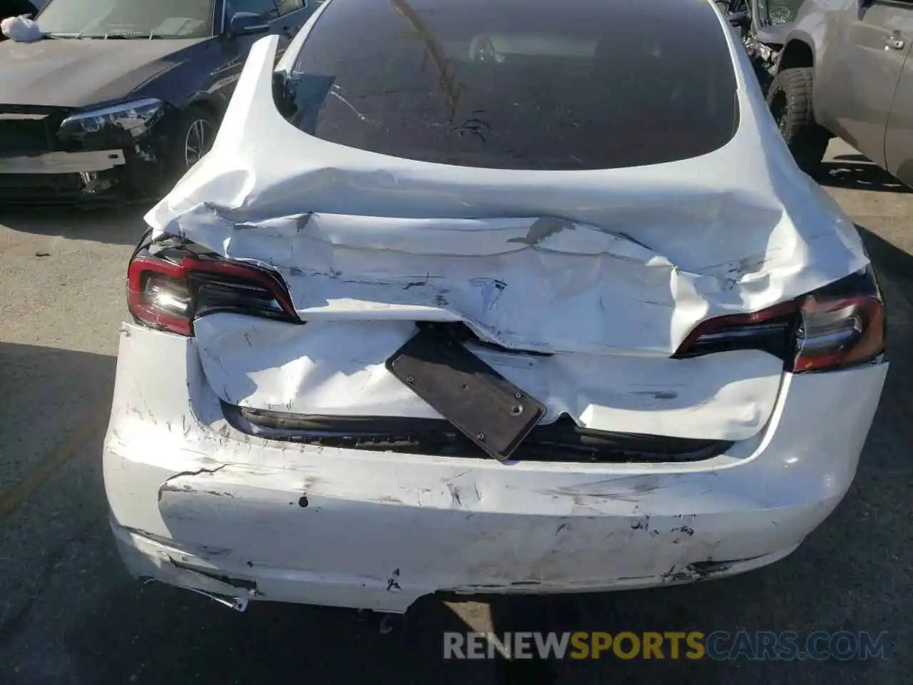 9 Photograph of a damaged car 5YJ3E1EA2MF874198 TESLA MODEL 3 2021