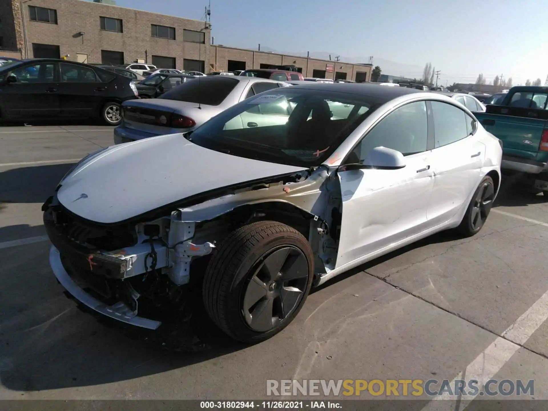 2 Photograph of a damaged car 5YJ3E1EA2MF874508 TESLA MODEL 3 2021