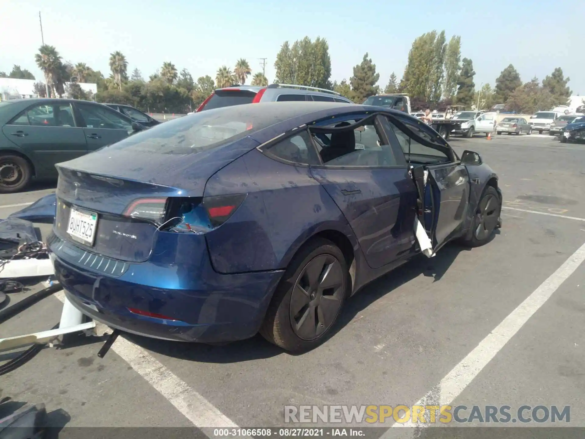 4 Photograph of a damaged car 5YJ3E1EA2MF876369 TESLA MODEL 3 2021