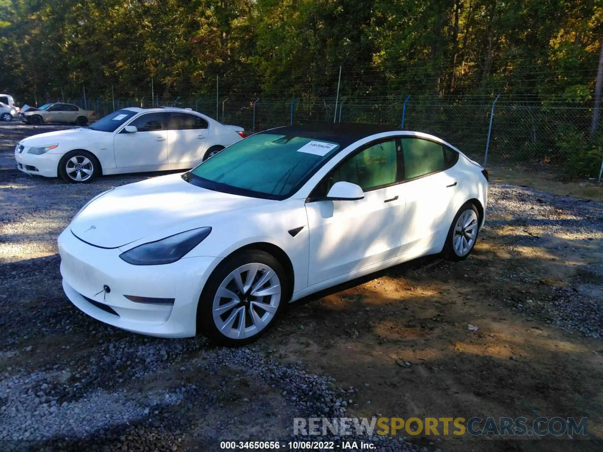 2 Photograph of a damaged car 5YJ3E1EA2MF908317 TESLA MODEL 3 2021