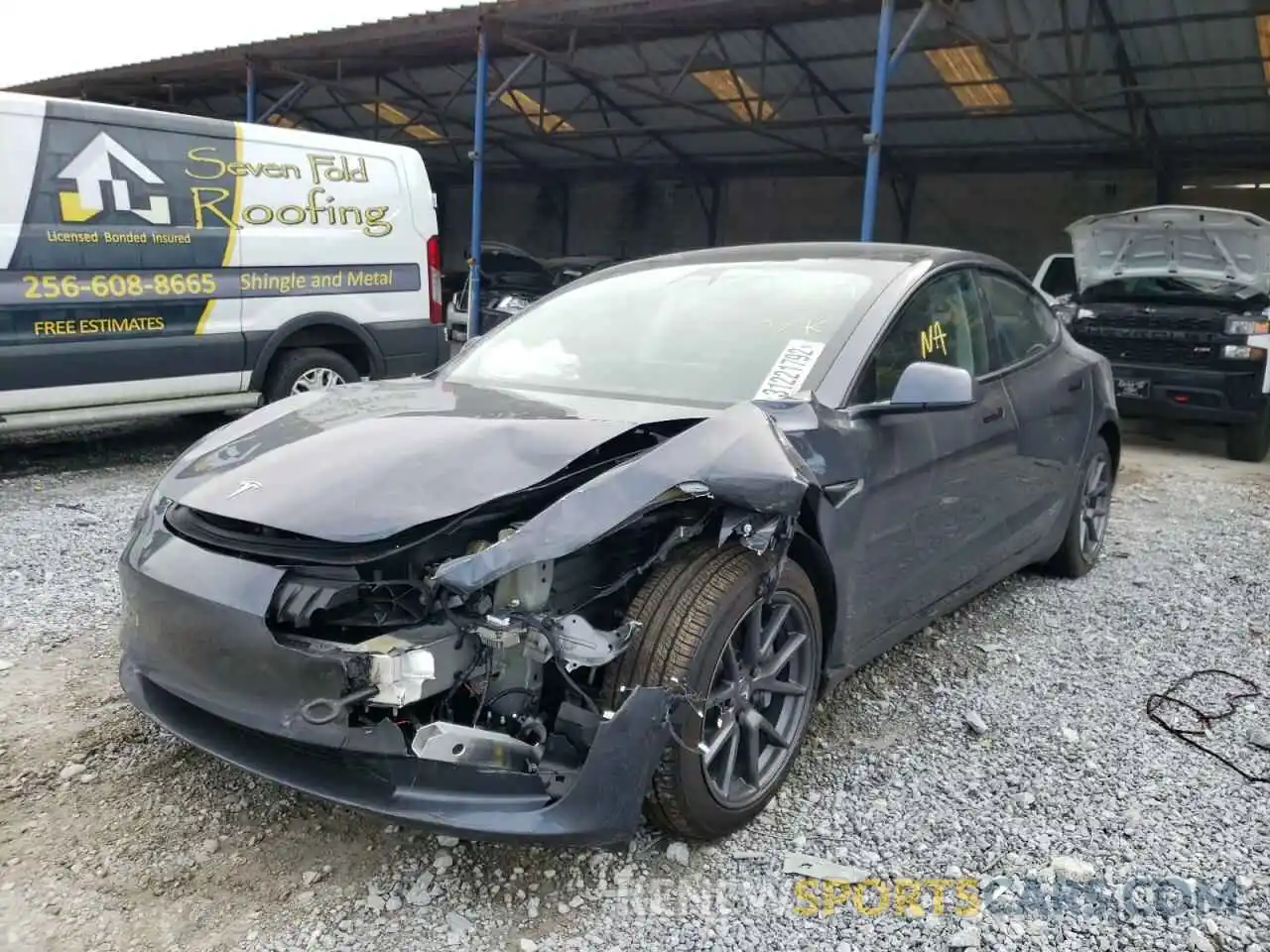 2 Photograph of a damaged car 5YJ3E1EA2MF911542 TESLA MODEL 3 2021