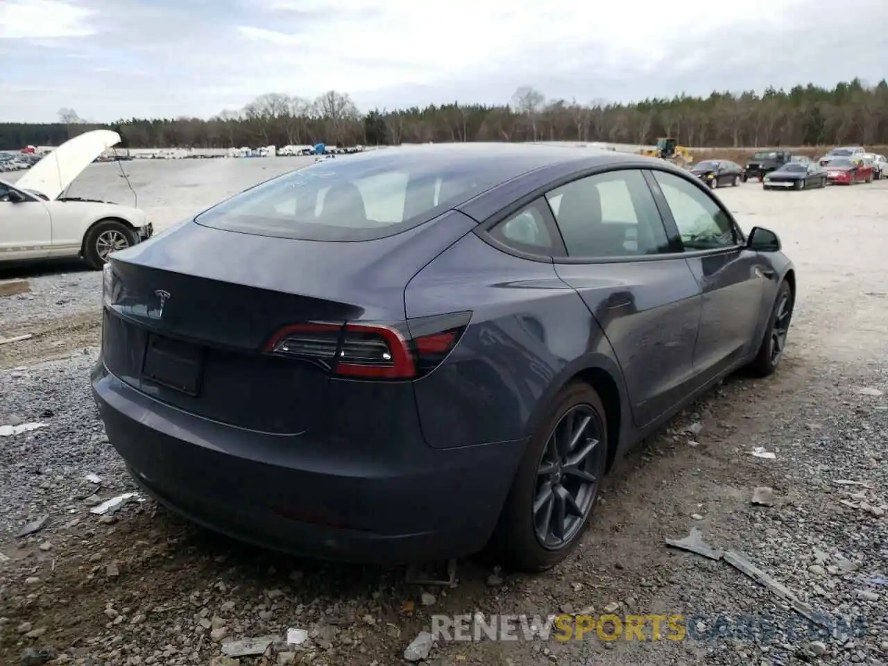 4 Photograph of a damaged car 5YJ3E1EA2MF911542 TESLA MODEL 3 2021