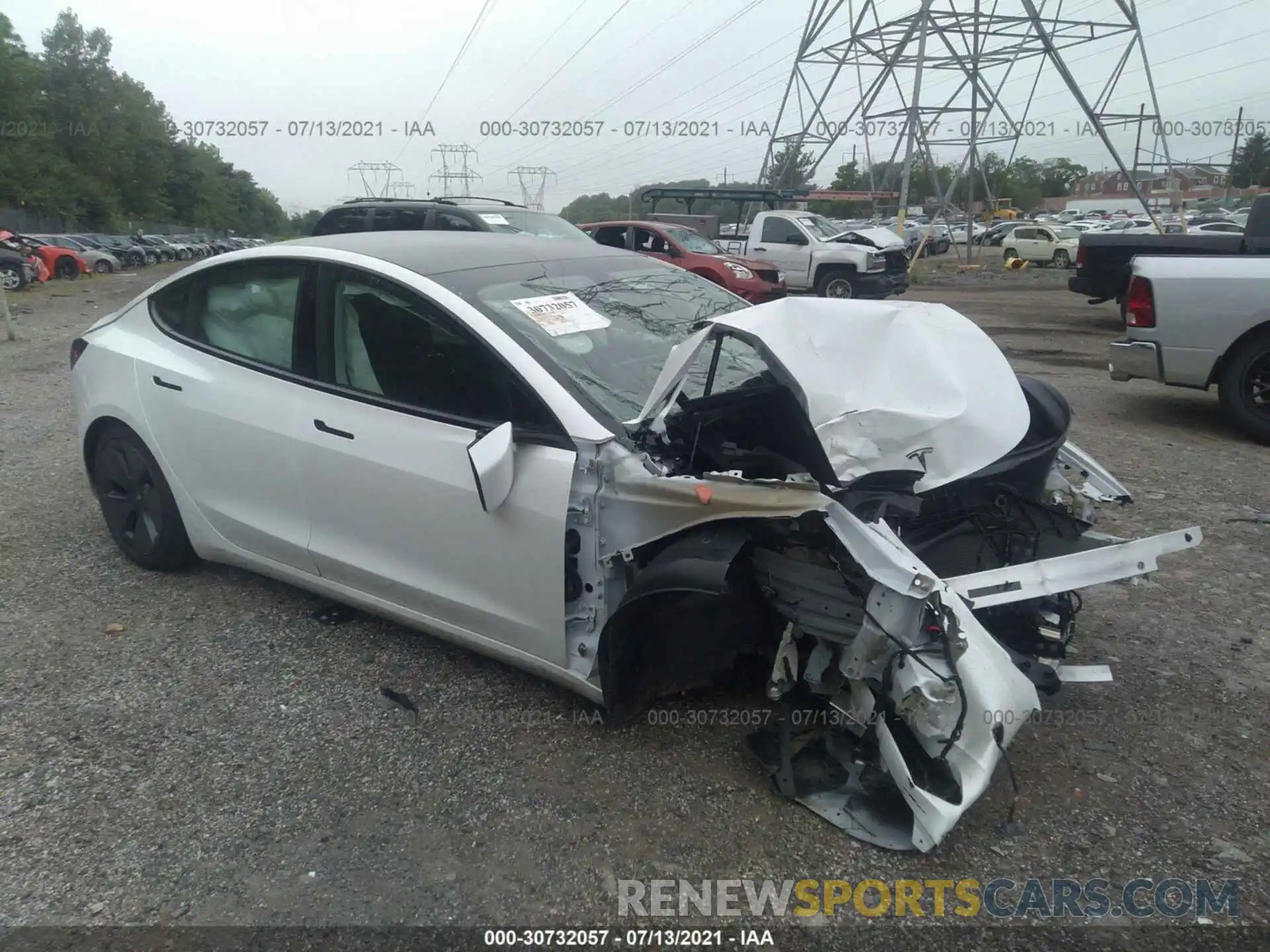 1 Photograph of a damaged car 5YJ3E1EA2MF914814 TESLA MODEL 3 2021