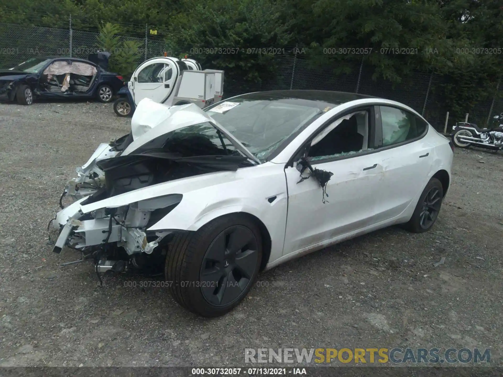 2 Photograph of a damaged car 5YJ3E1EA2MF914814 TESLA MODEL 3 2021