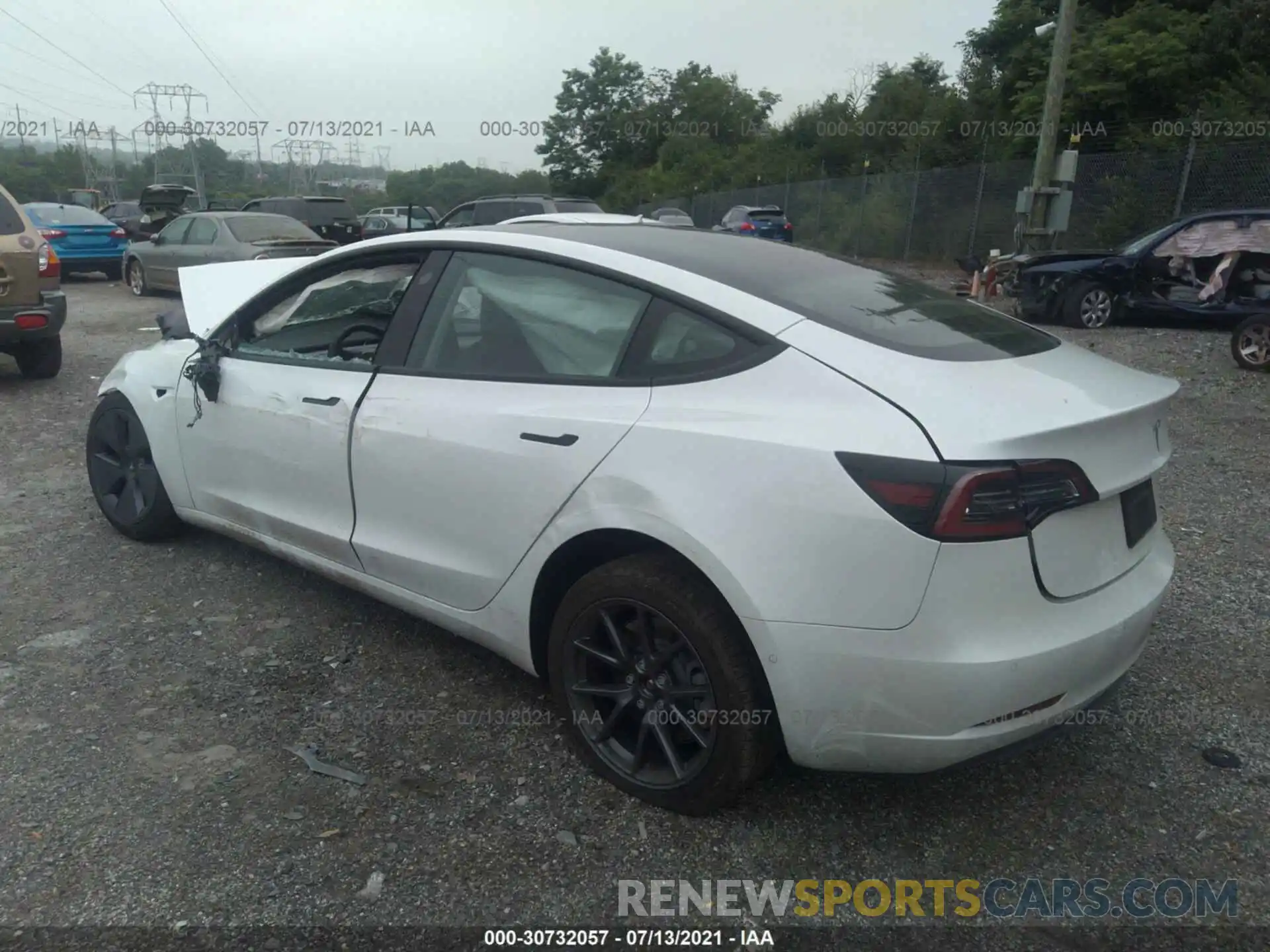 3 Photograph of a damaged car 5YJ3E1EA2MF914814 TESLA MODEL 3 2021