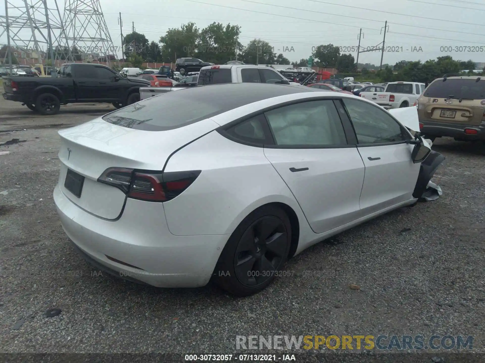 4 Photograph of a damaged car 5YJ3E1EA2MF914814 TESLA MODEL 3 2021