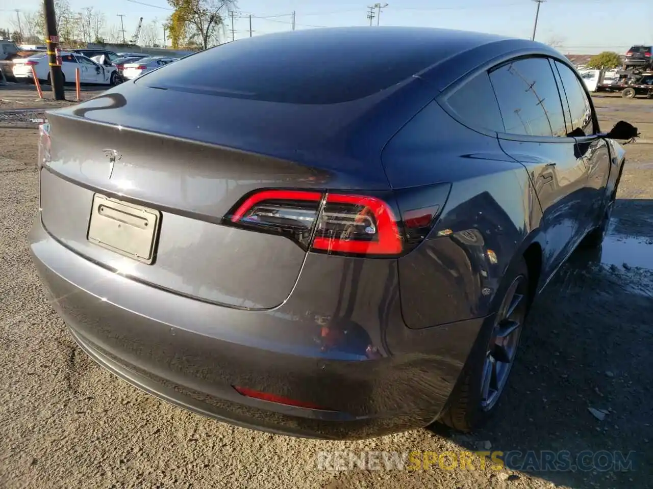 4 Photograph of a damaged car 5YJ3E1EA2MF923240 TESLA MODEL 3 2021