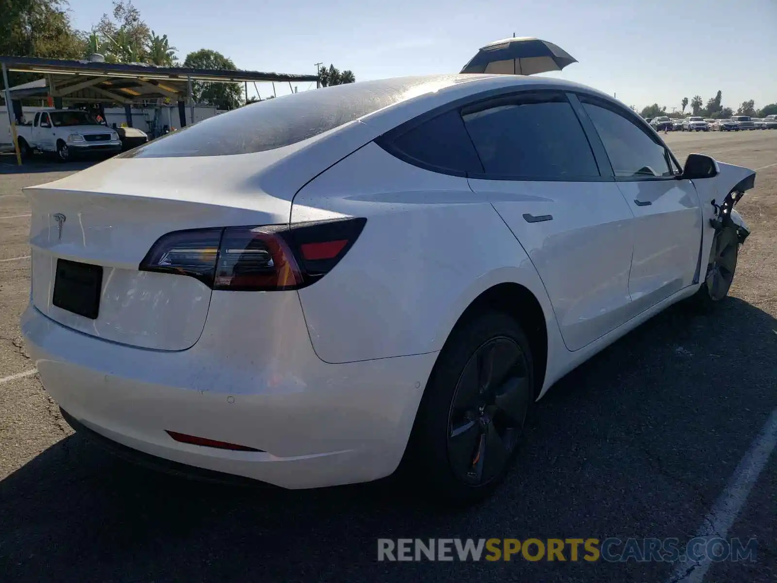 4 Photograph of a damaged car 5YJ3E1EA2MF930396 TESLA MODEL 3 2021