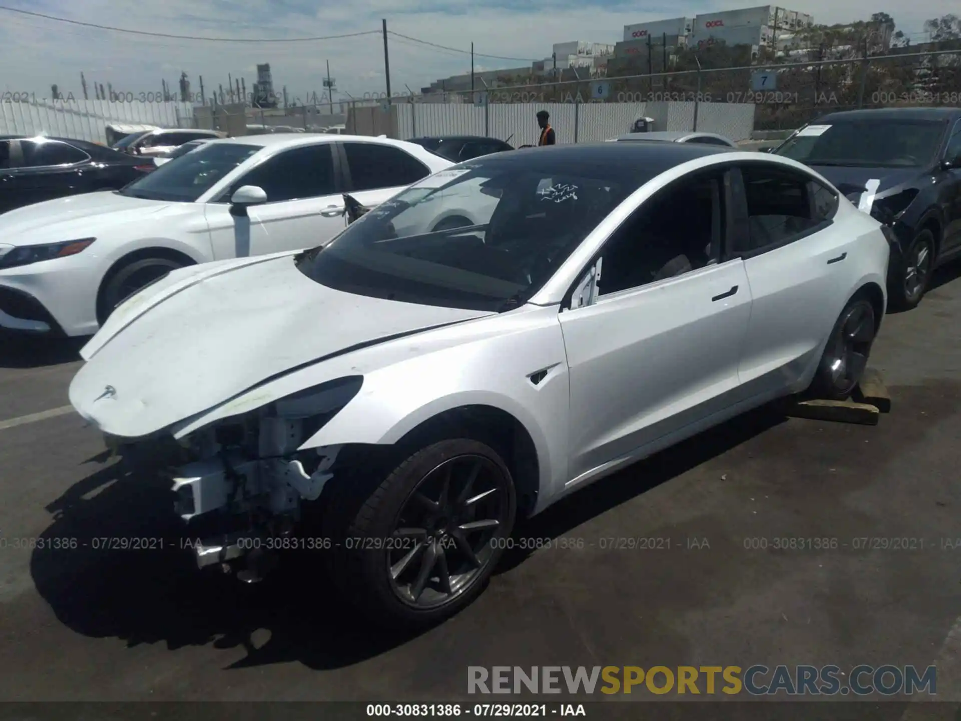 2 Photograph of a damaged car 5YJ3E1EA2MF930592 TESLA MODEL 3 2021