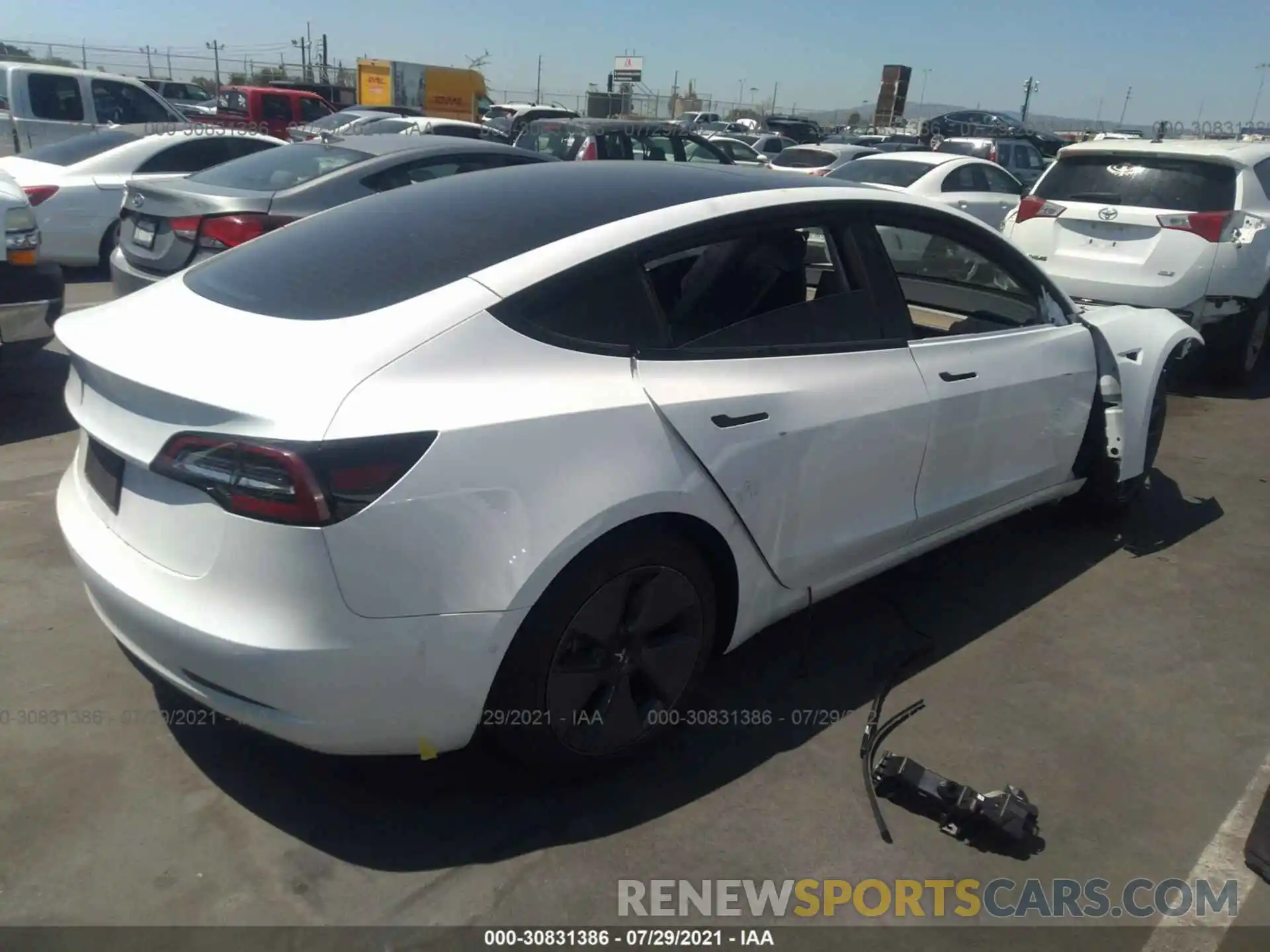 4 Фотография поврежденного автомобиля 5YJ3E1EA2MF930592 TESLA MODEL 3 2021