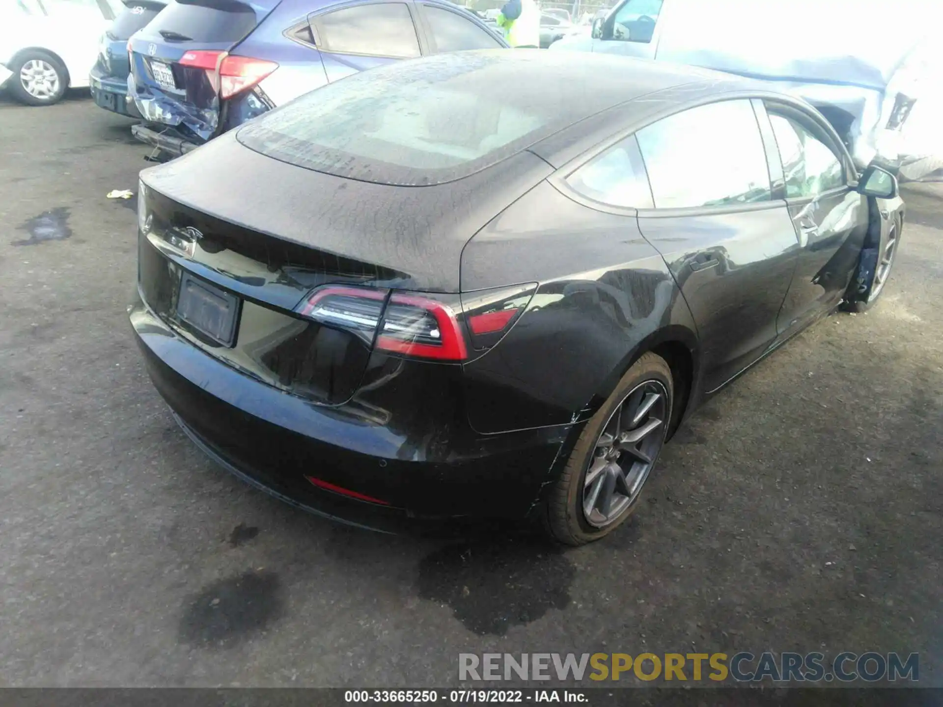 4 Photograph of a damaged car 5YJ3E1EA2MF938577 TESLA MODEL 3 2021