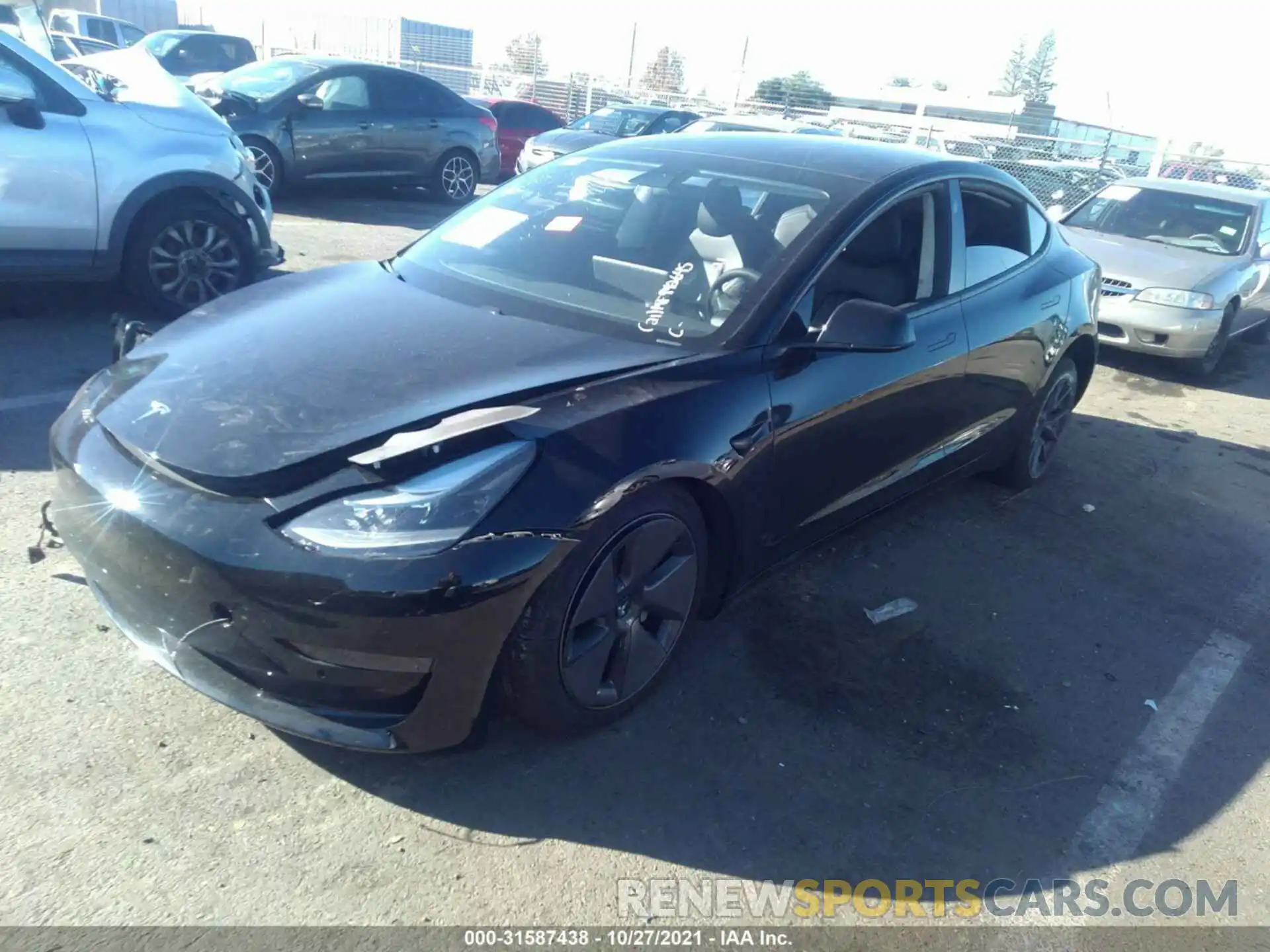 2 Photograph of a damaged car 5YJ3E1EA2MF942645 TESLA MODEL 3 2021