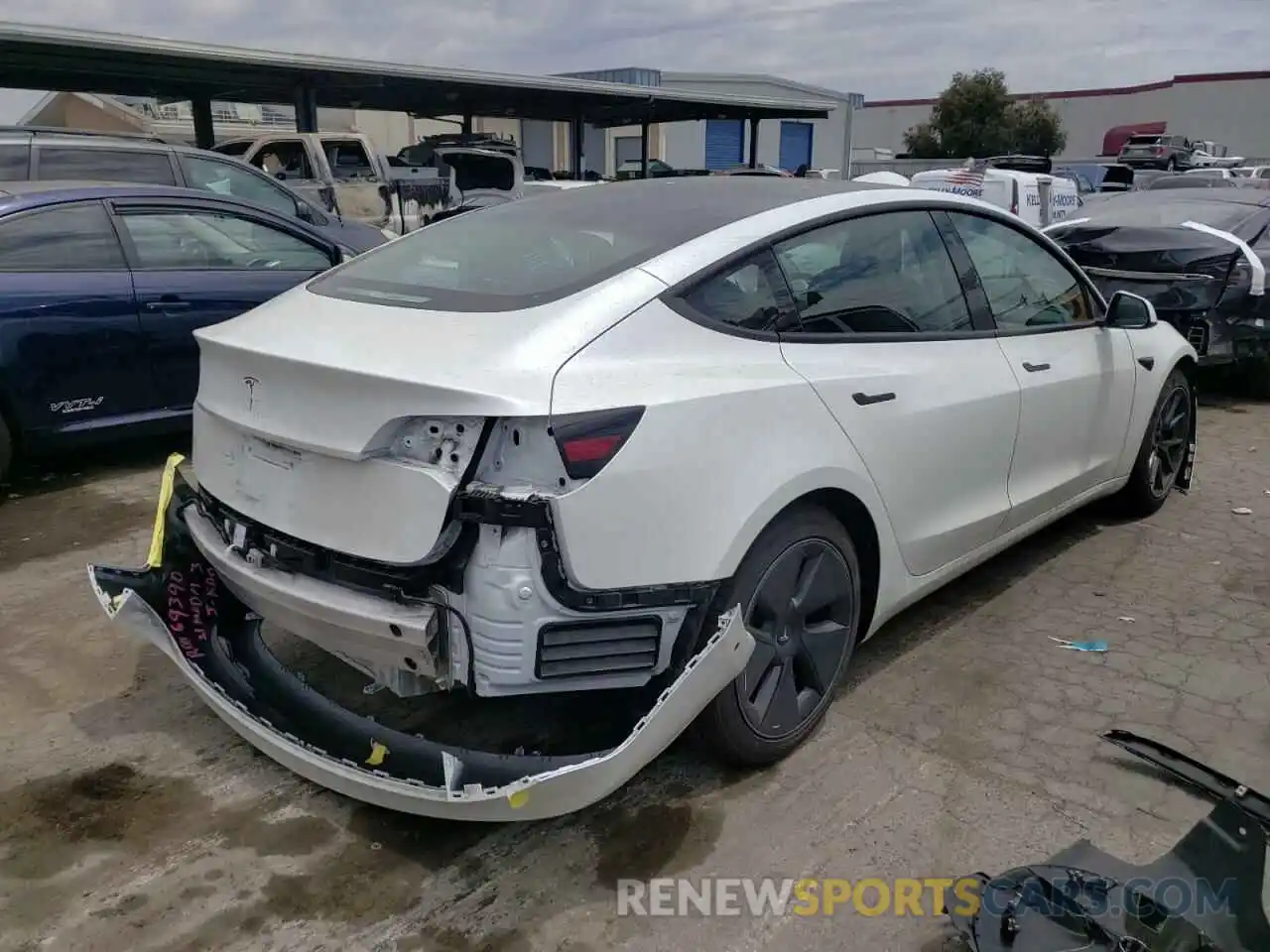 4 Photograph of a damaged car 5YJ3E1EA2MF943049 TESLA MODEL 3 2021