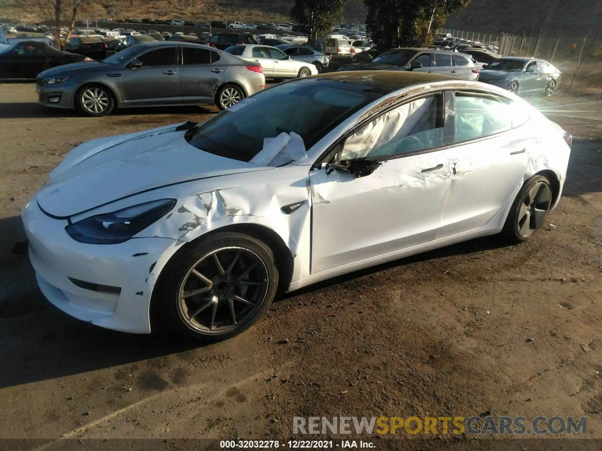 2 Photograph of a damaged car 5YJ3E1EA2MF976956 TESLA MODEL 3 2021