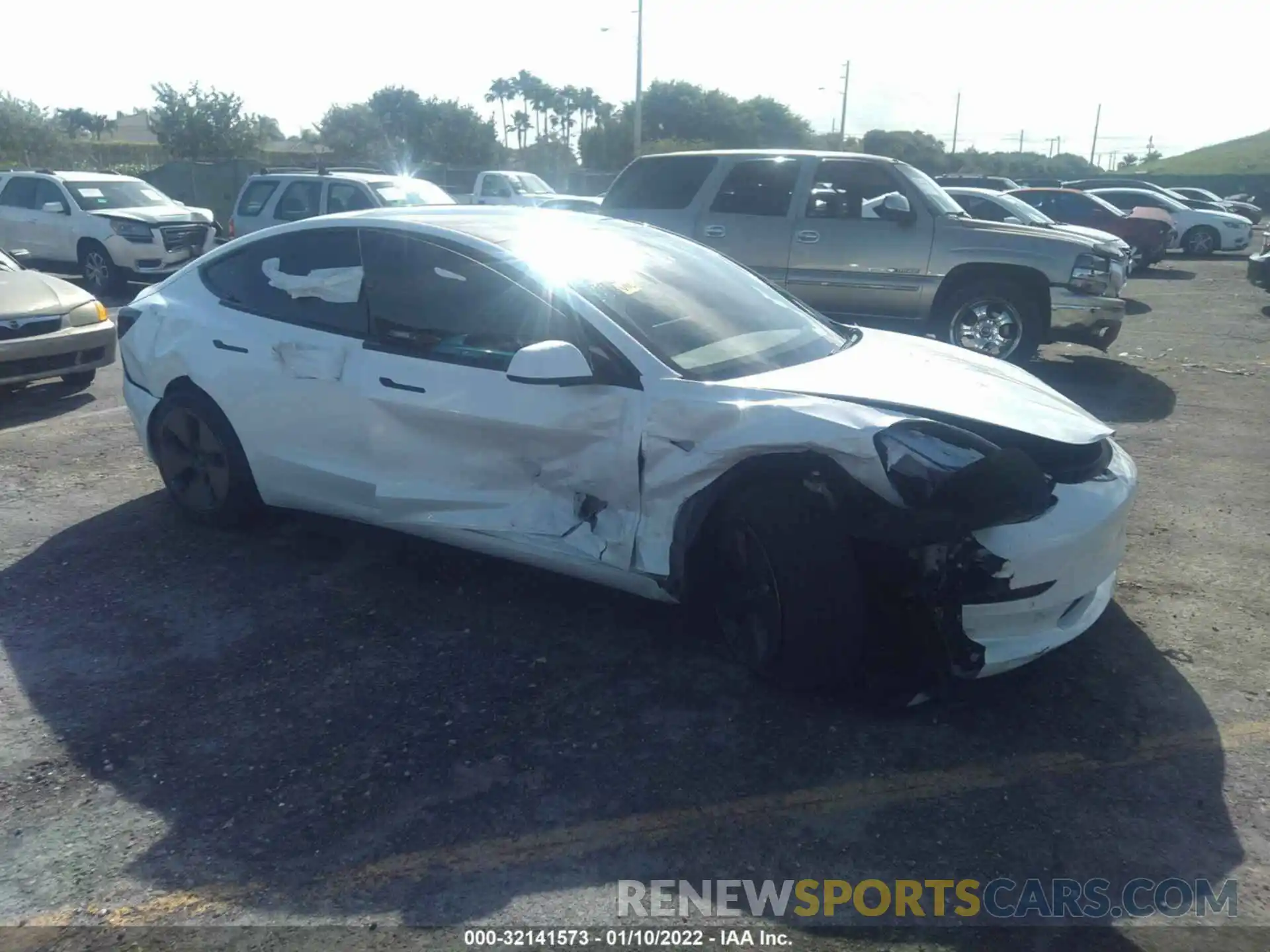 1 Photograph of a damaged car 5YJ3E1EA2MF985463 TESLA MODEL 3 2021