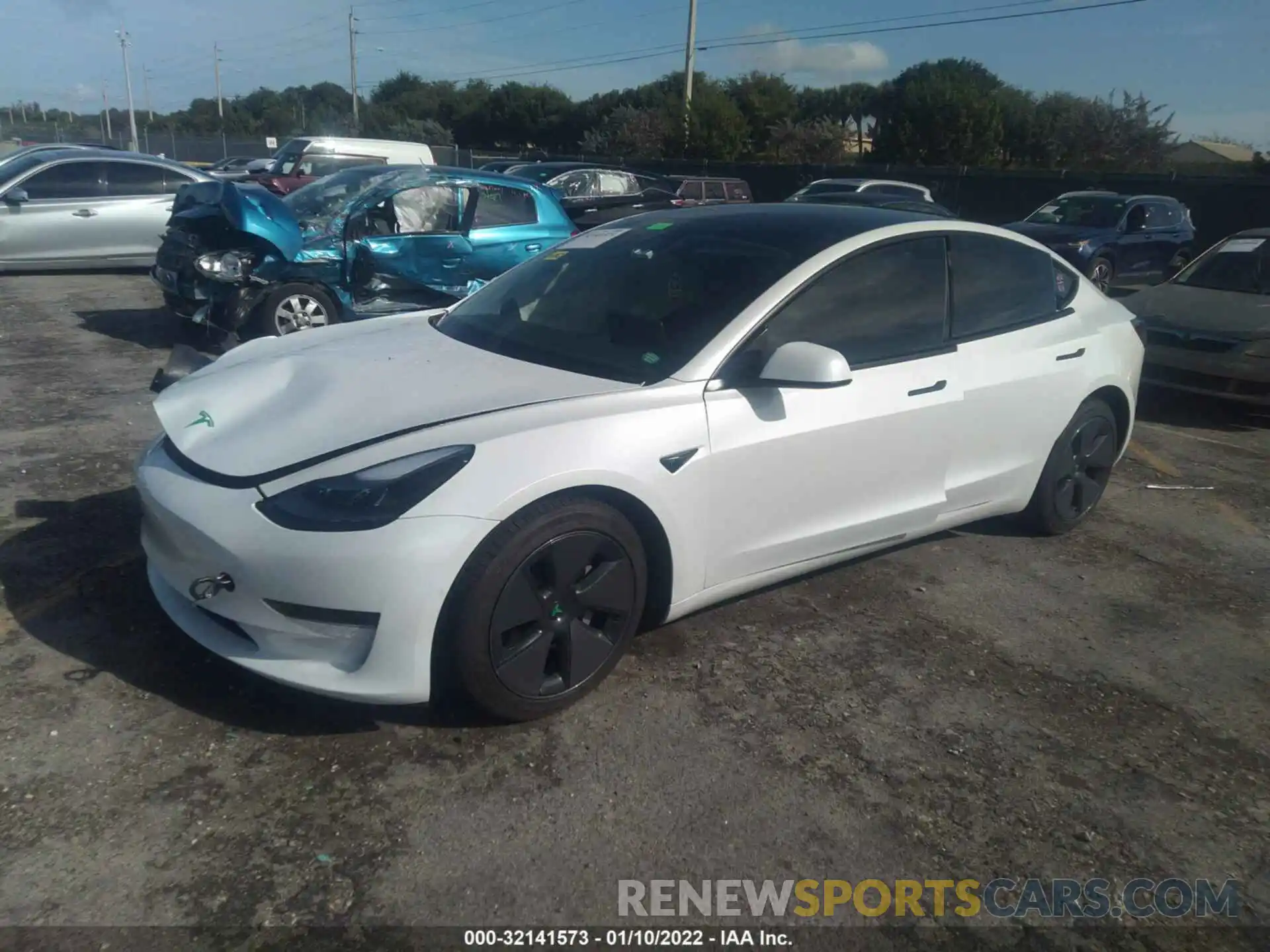 2 Photograph of a damaged car 5YJ3E1EA2MF985463 TESLA MODEL 3 2021