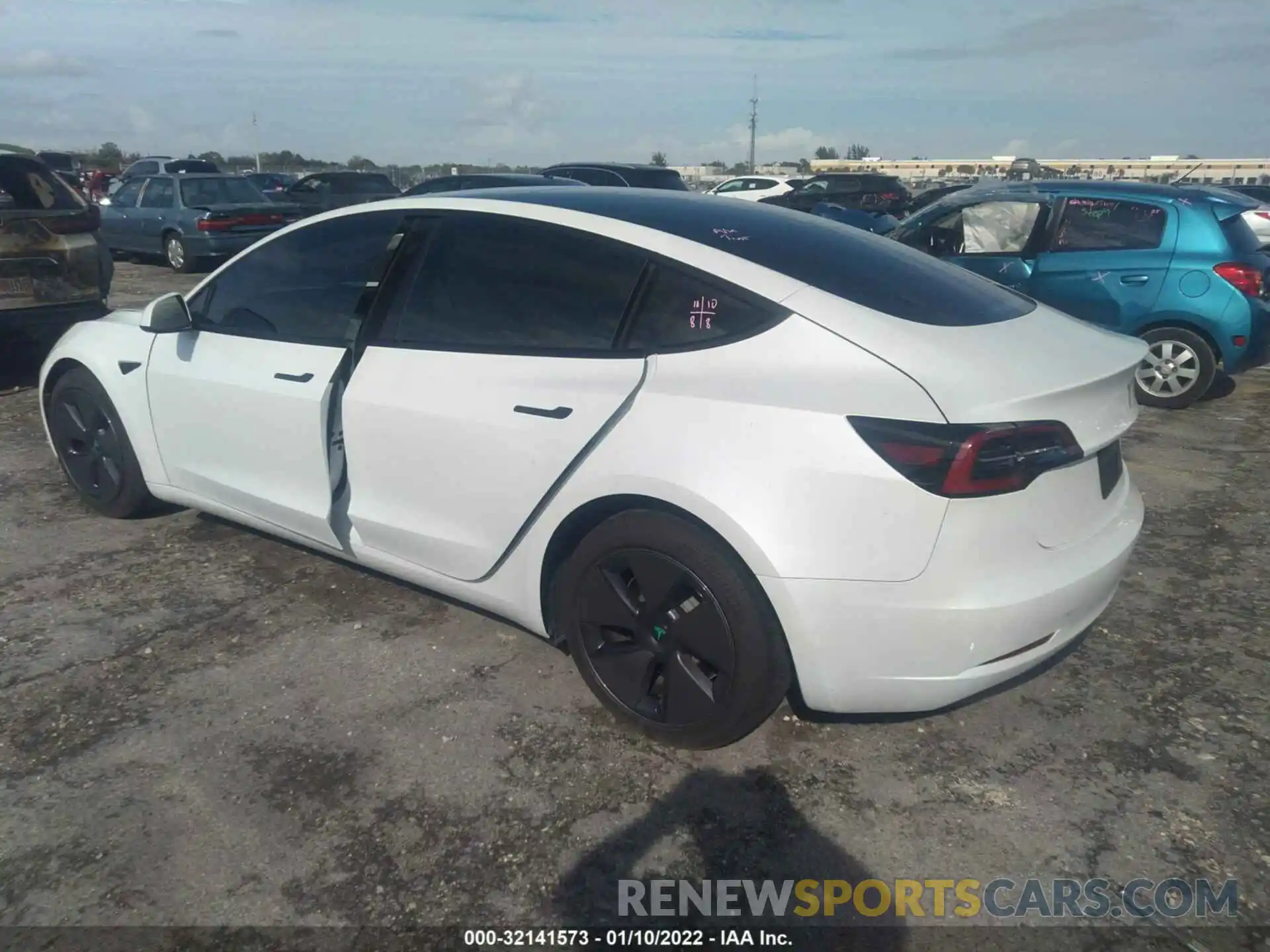 3 Photograph of a damaged car 5YJ3E1EA2MF985463 TESLA MODEL 3 2021