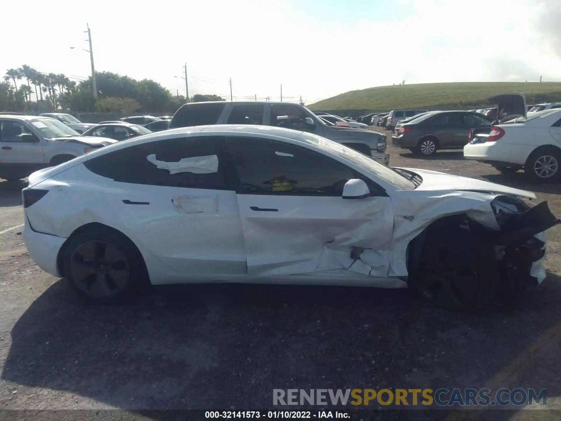 6 Photograph of a damaged car 5YJ3E1EA2MF985463 TESLA MODEL 3 2021