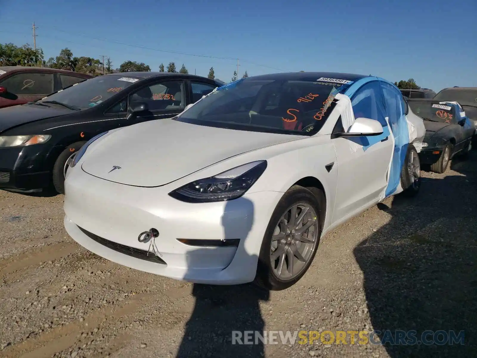 2 Photograph of a damaged car 5YJ3E1EA2MF986449 TESLA MODEL 3 2021