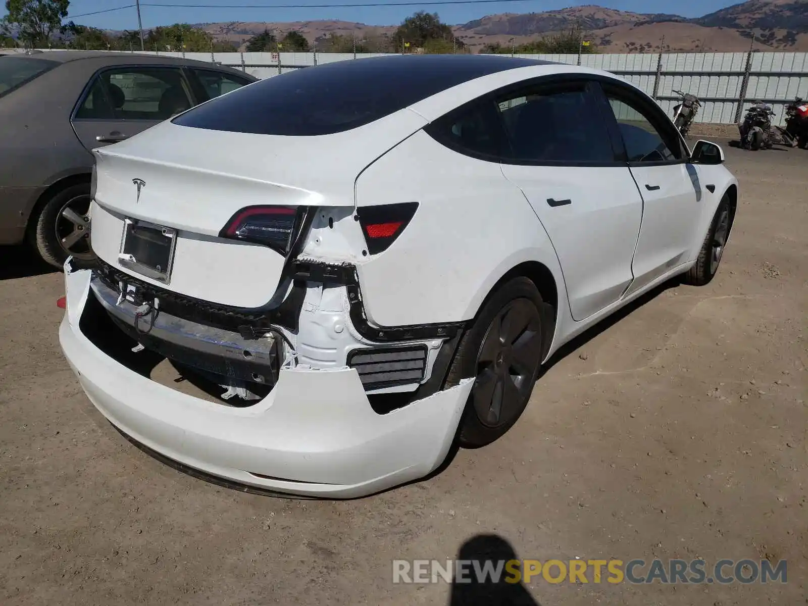 4 Photograph of a damaged car 5YJ3E1EA2MF986449 TESLA MODEL 3 2021