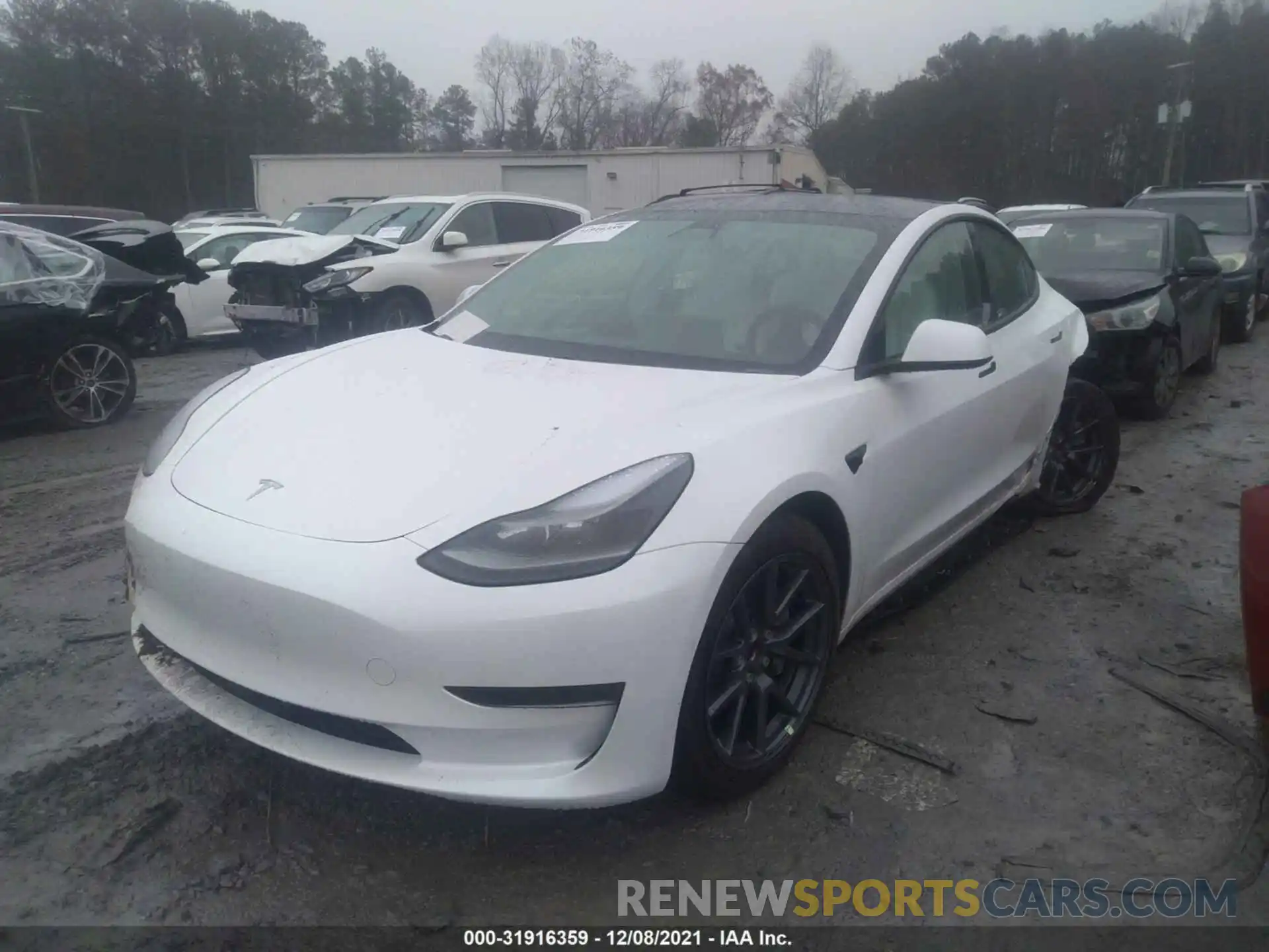 2 Photograph of a damaged car 5YJ3E1EA2MF987603 TESLA MODEL 3 2021