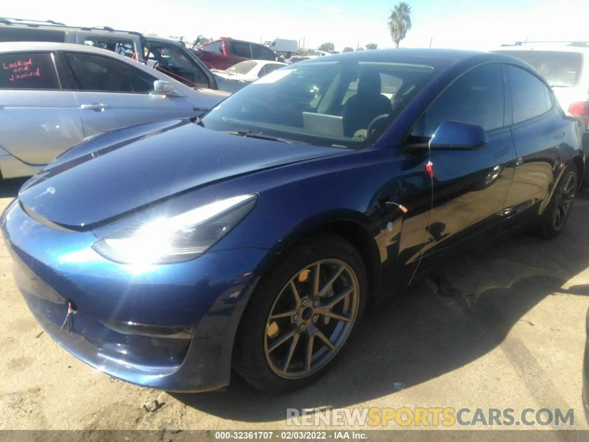 2 Photograph of a damaged car 5YJ3E1EA2MF991165 TESLA MODEL 3 2021