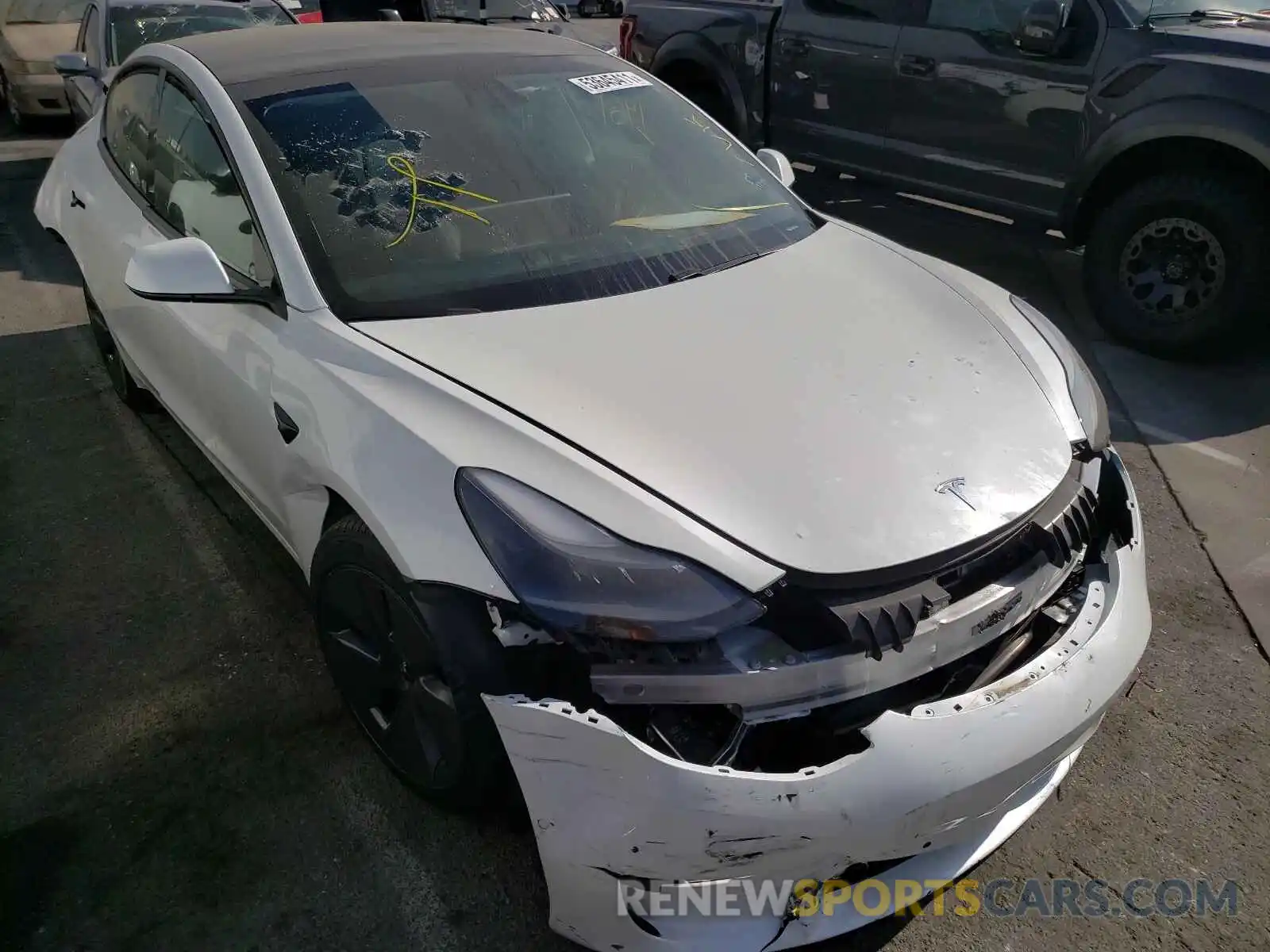 1 Photograph of a damaged car 5YJ3E1EA2MF992557 TESLA MODEL 3 2021