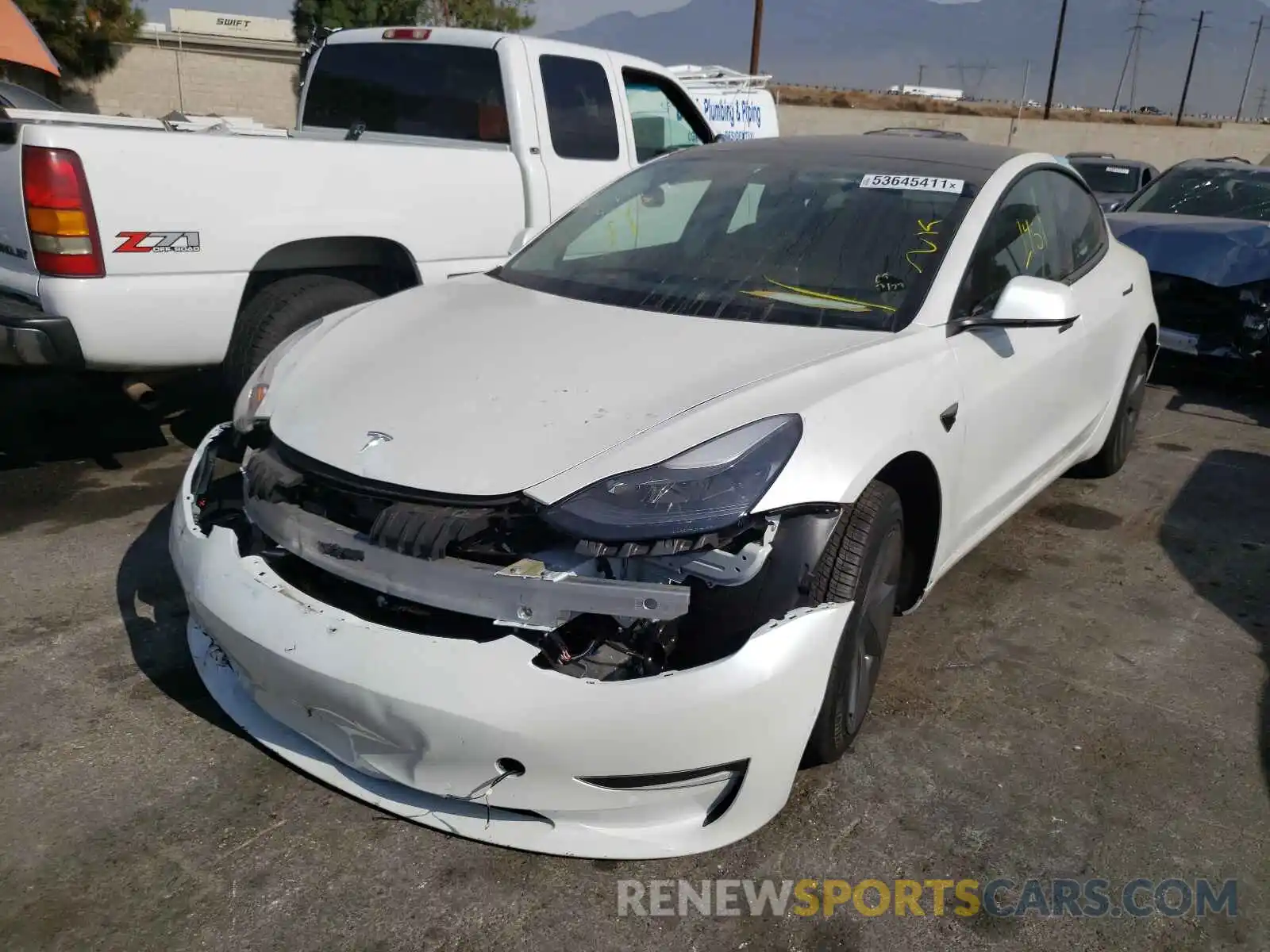 2 Photograph of a damaged car 5YJ3E1EA2MF992557 TESLA MODEL 3 2021