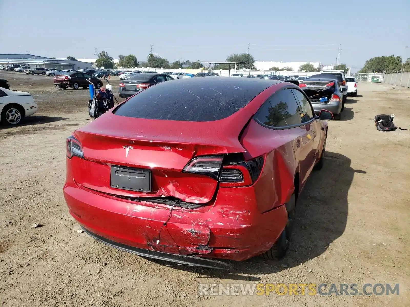 4 Photograph of a damaged car 5YJ3E1EA2MF998178 TESLA MODEL 3 2021