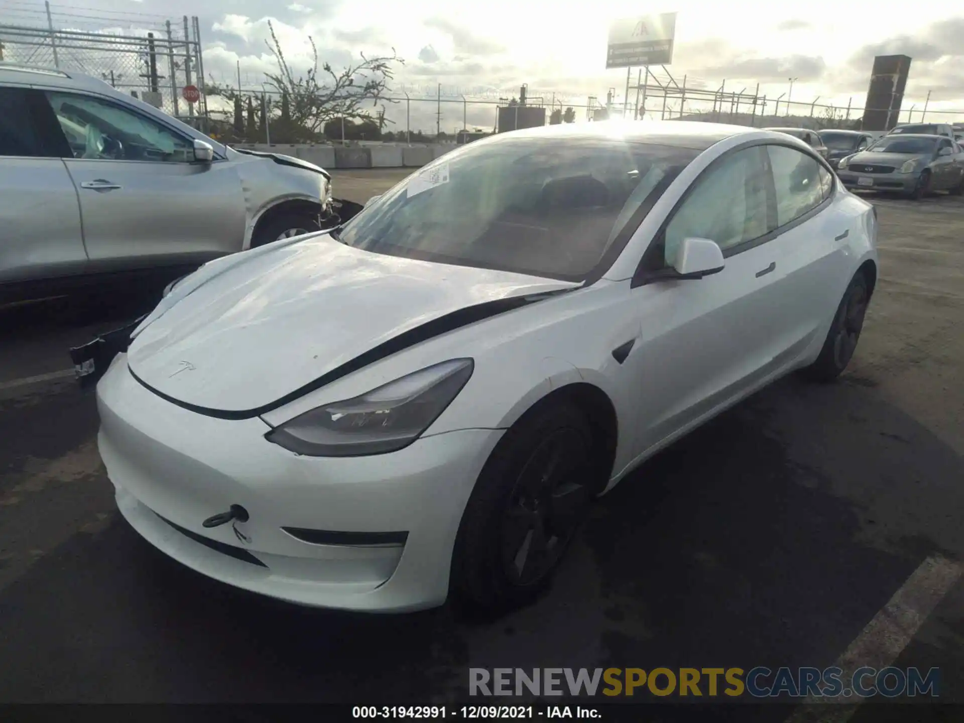 2 Photograph of a damaged car 5YJ3E1EA3MF015928 TESLA MODEL 3 2021