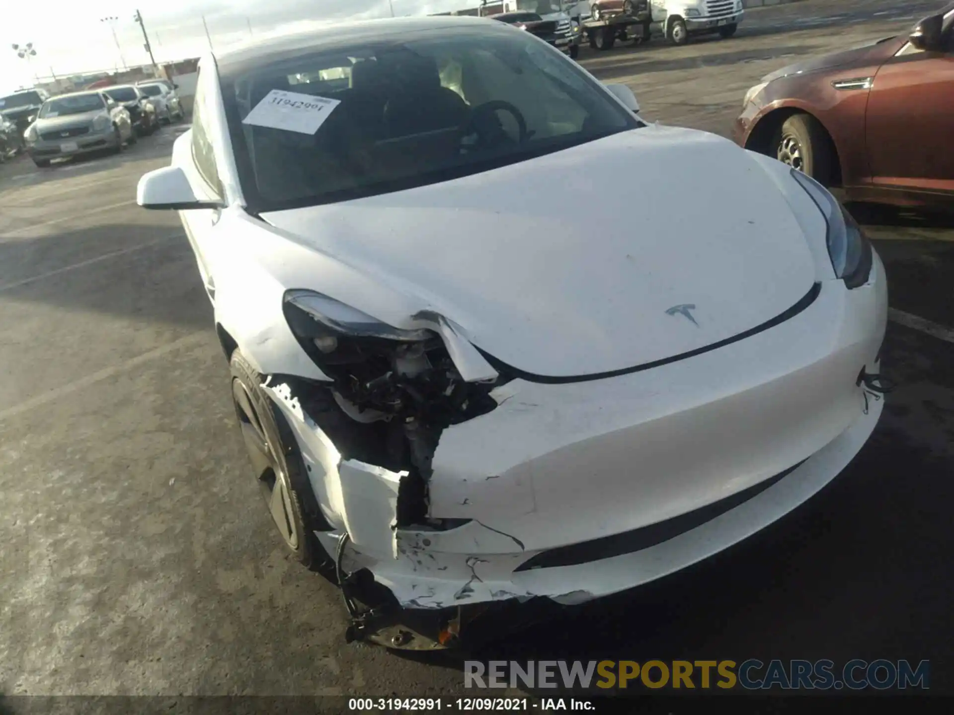 6 Photograph of a damaged car 5YJ3E1EA3MF015928 TESLA MODEL 3 2021