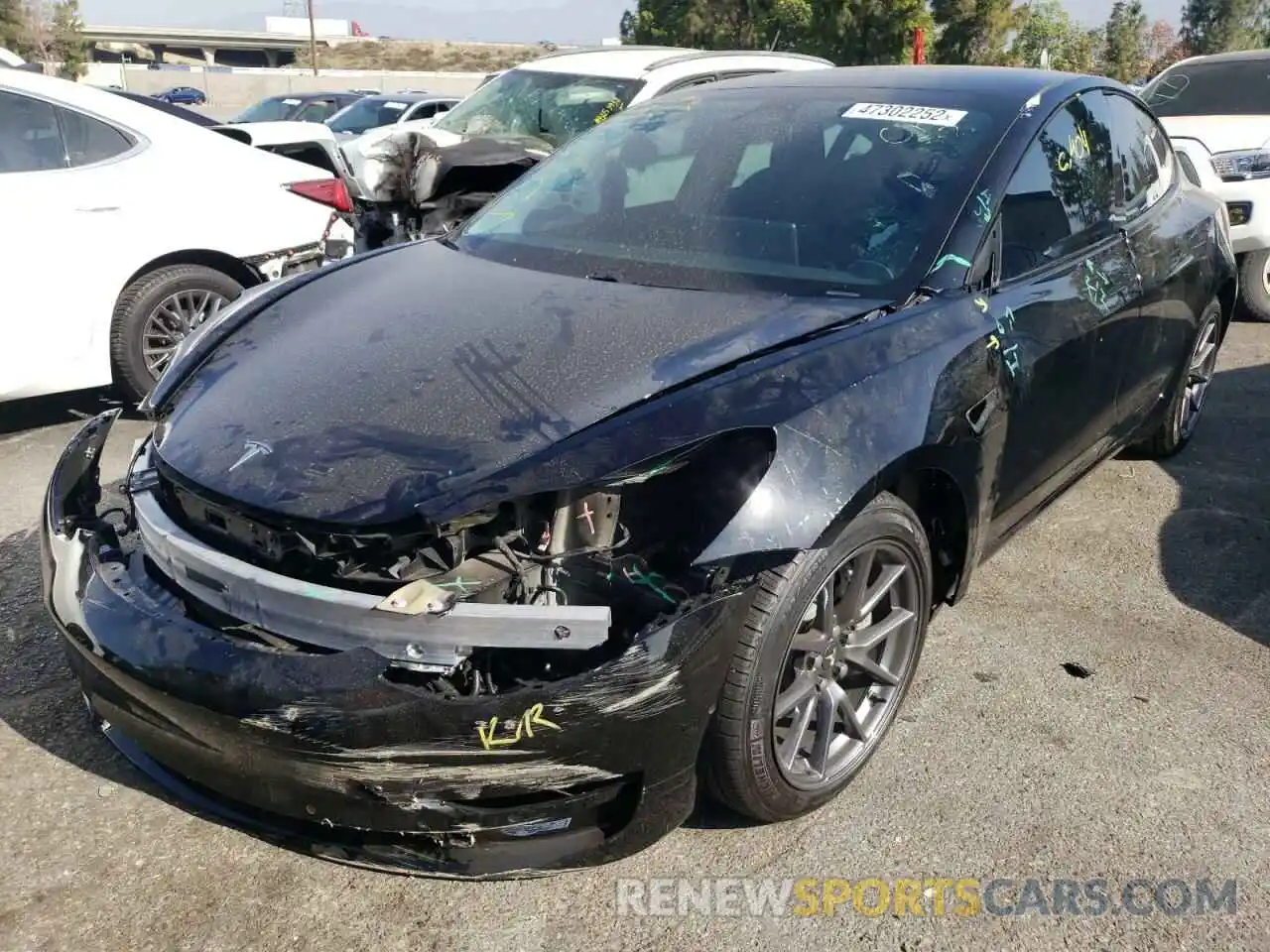 2 Photograph of a damaged car 5YJ3E1EA3MF022507 TESLA MODEL 3 2021