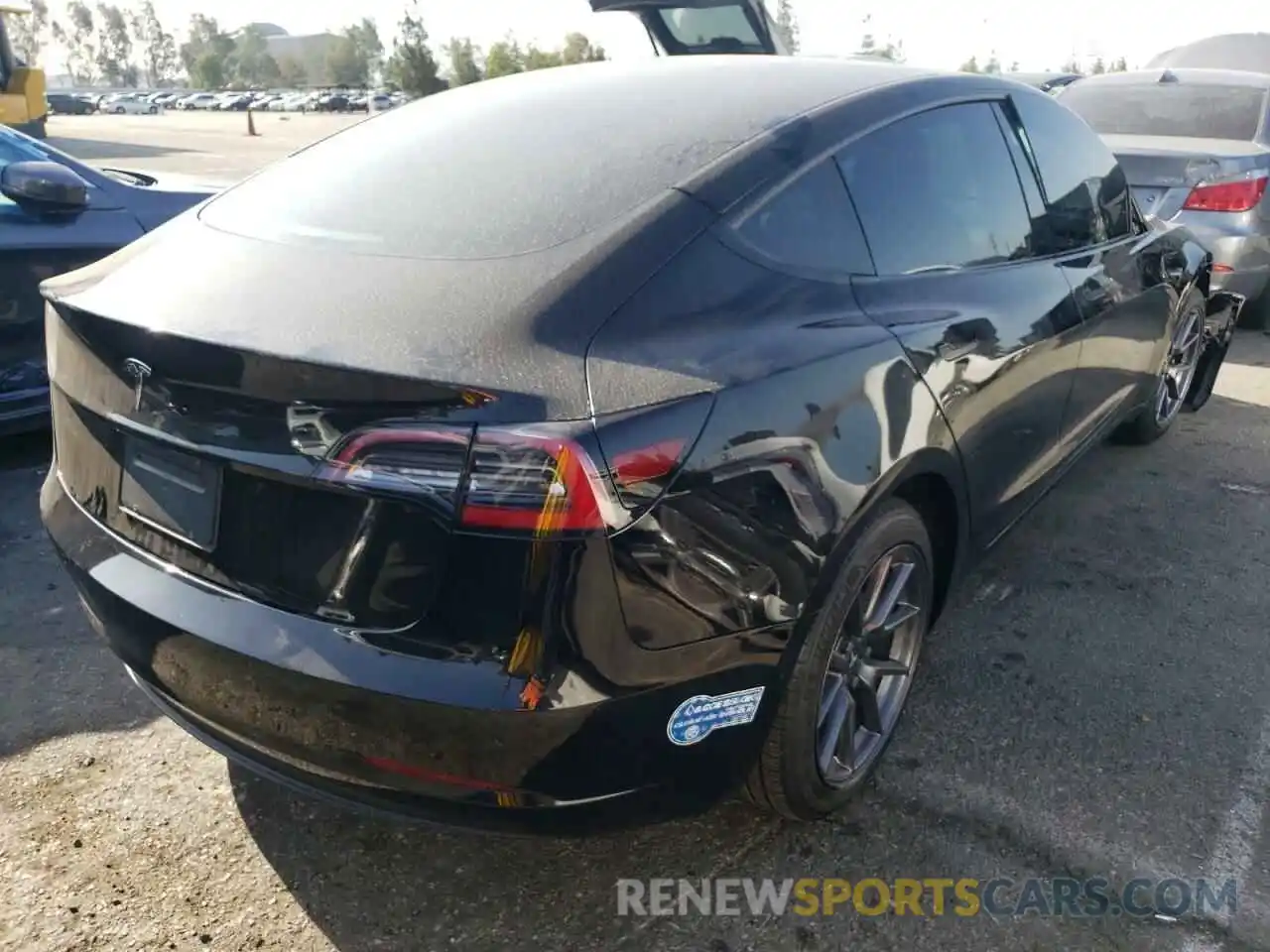 4 Photograph of a damaged car 5YJ3E1EA3MF022507 TESLA MODEL 3 2021