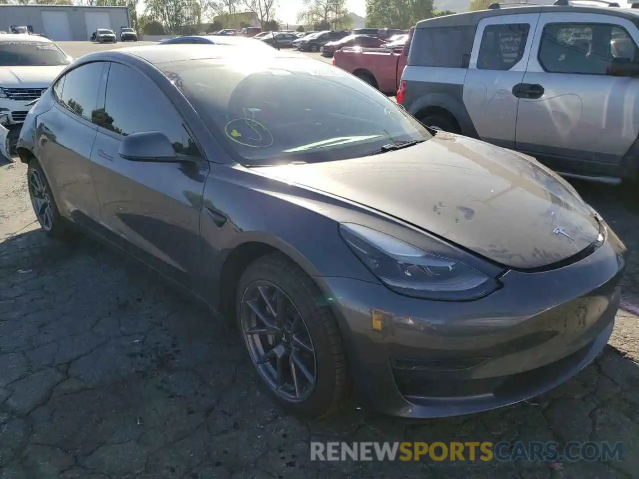 1 Photograph of a damaged car 5YJ3E1EA3MF051618 TESLA MODEL 3 2021