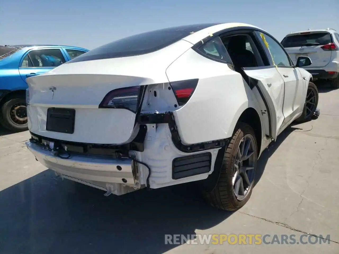 4 Photograph of a damaged car 5YJ3E1EA3MF098261 TESLA MODEL 3 2021