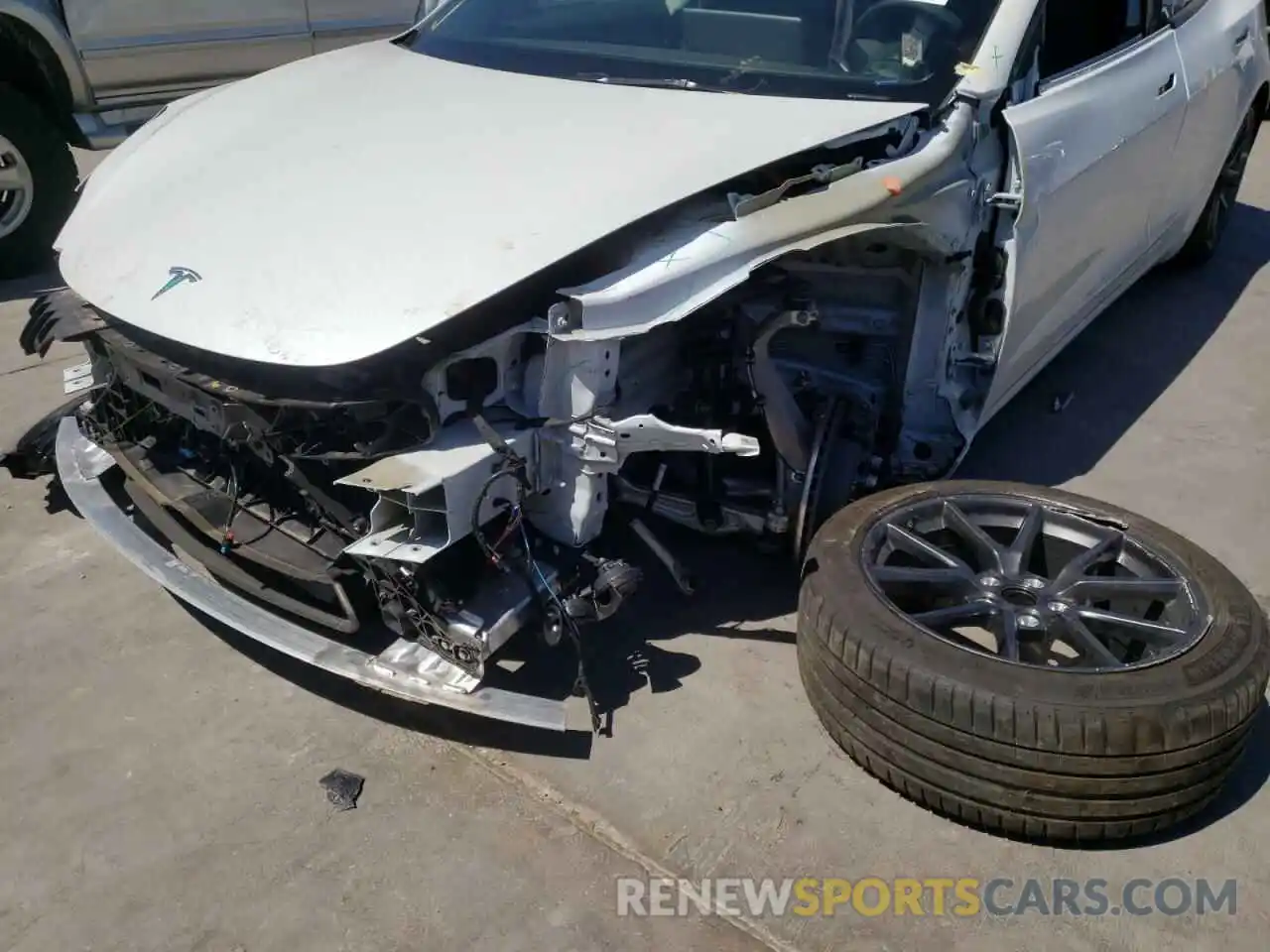 9 Photograph of a damaged car 5YJ3E1EA3MF098261 TESLA MODEL 3 2021