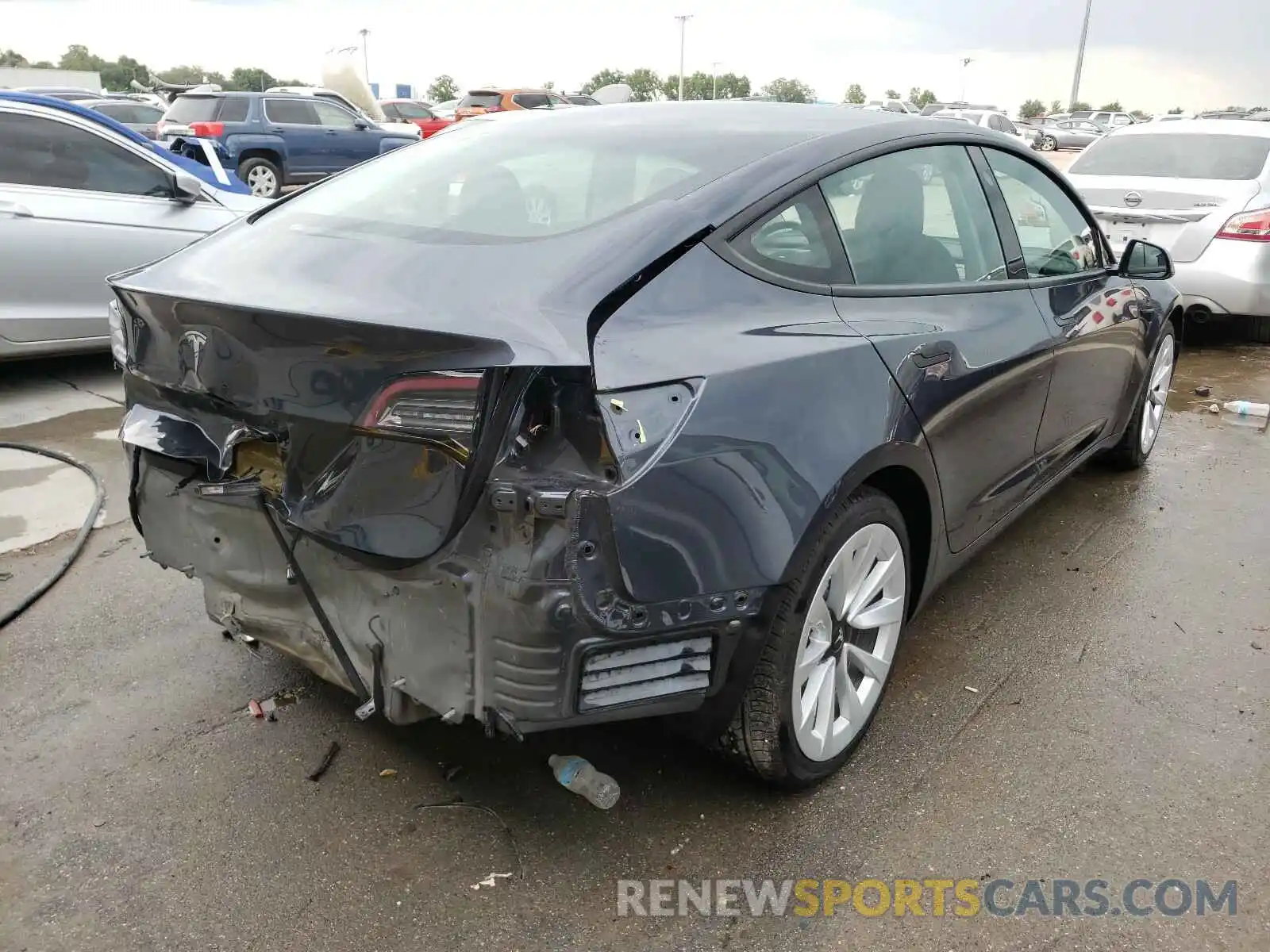 4 Photograph of a damaged car 5YJ3E1EA3MF851092 TESLA MODEL 3 2021