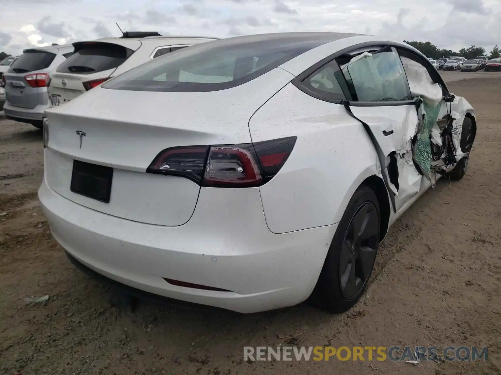 4 Photograph of a damaged car 5YJ3E1EA3MF853764 TESLA MODEL 3 2021