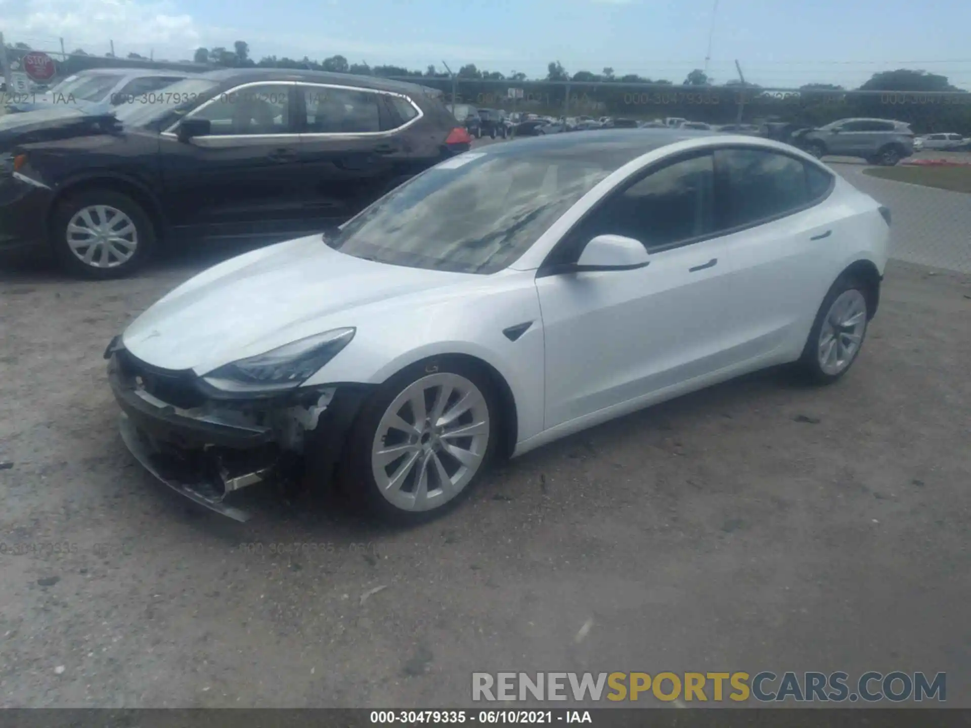 2 Photograph of a damaged car 5YJ3E1EA3MF856776 TESLA MODEL 3 2021