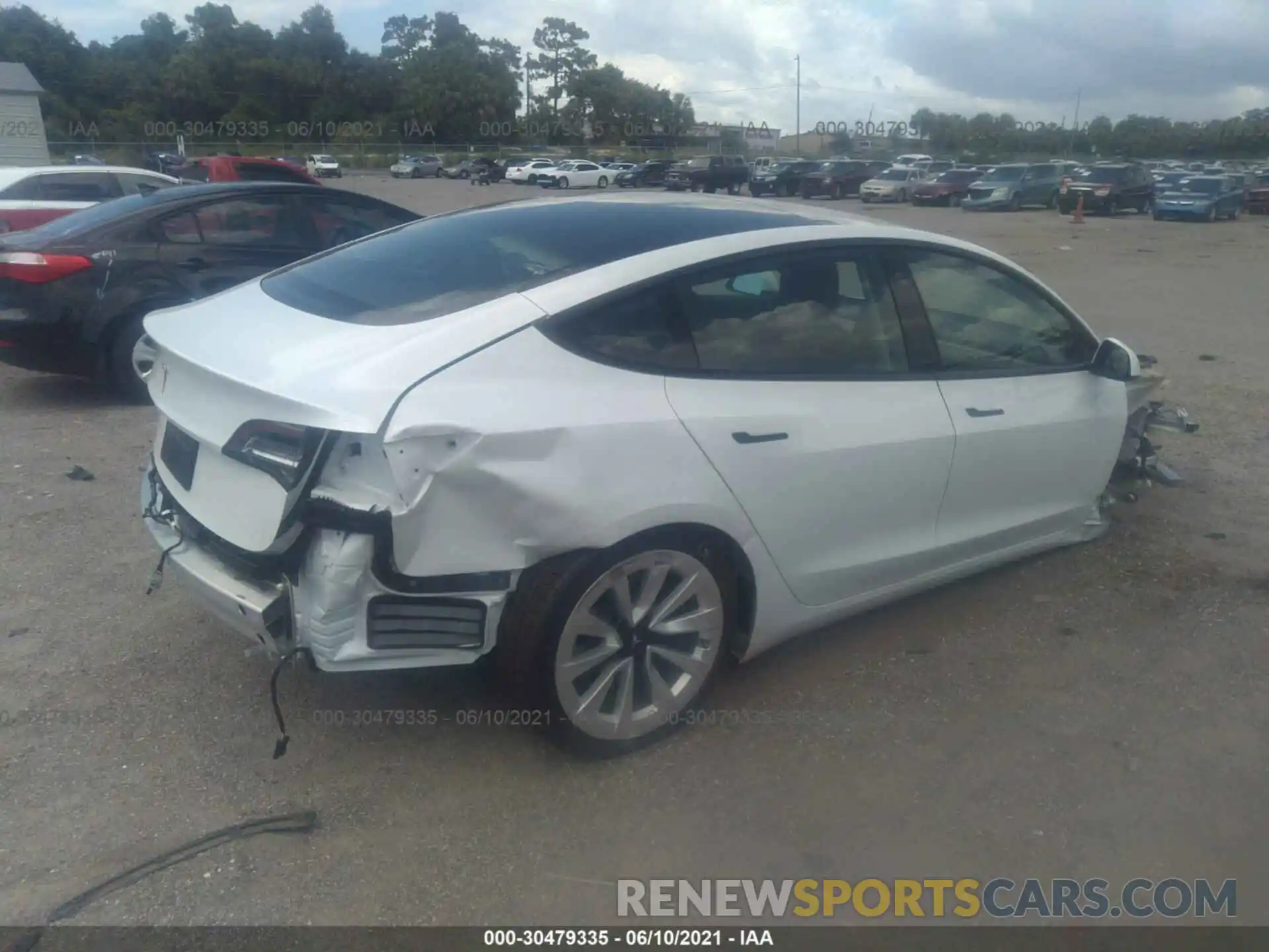 4 Photograph of a damaged car 5YJ3E1EA3MF856776 TESLA MODEL 3 2021