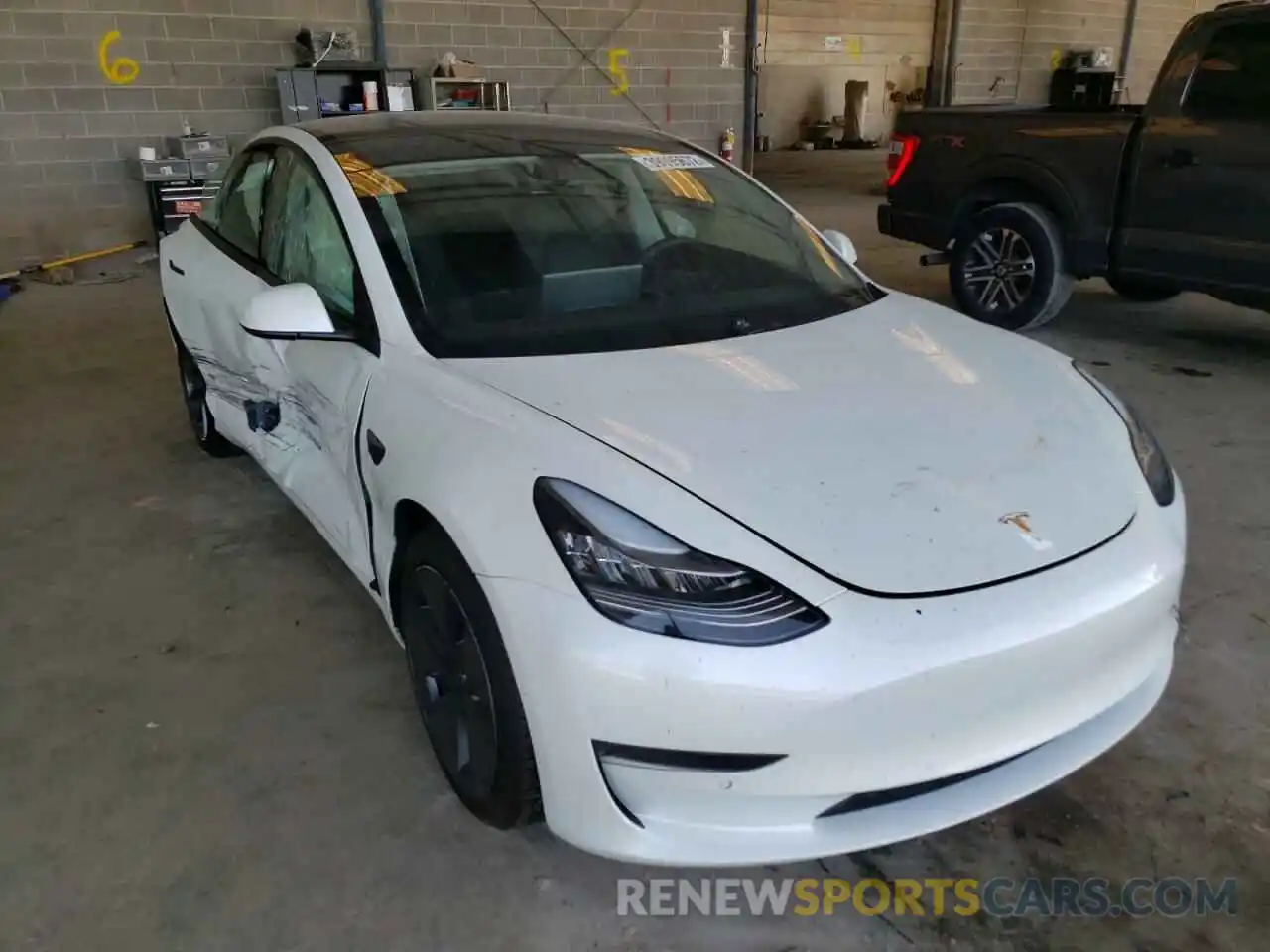 1 Photograph of a damaged car 5YJ3E1EA3MF861380 TESLA MODEL 3 2021