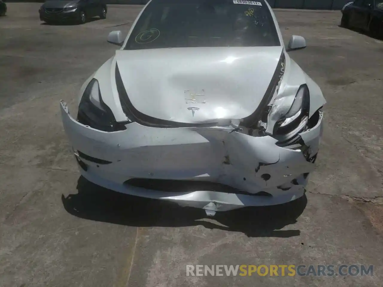 9 Photograph of a damaged car 5YJ3E1EA3MF871715 TESLA MODEL 3 2021